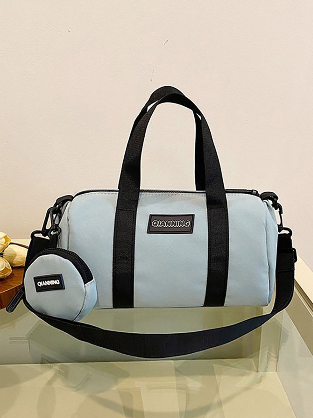 StyleCast x Revolte Structured Sling Bag