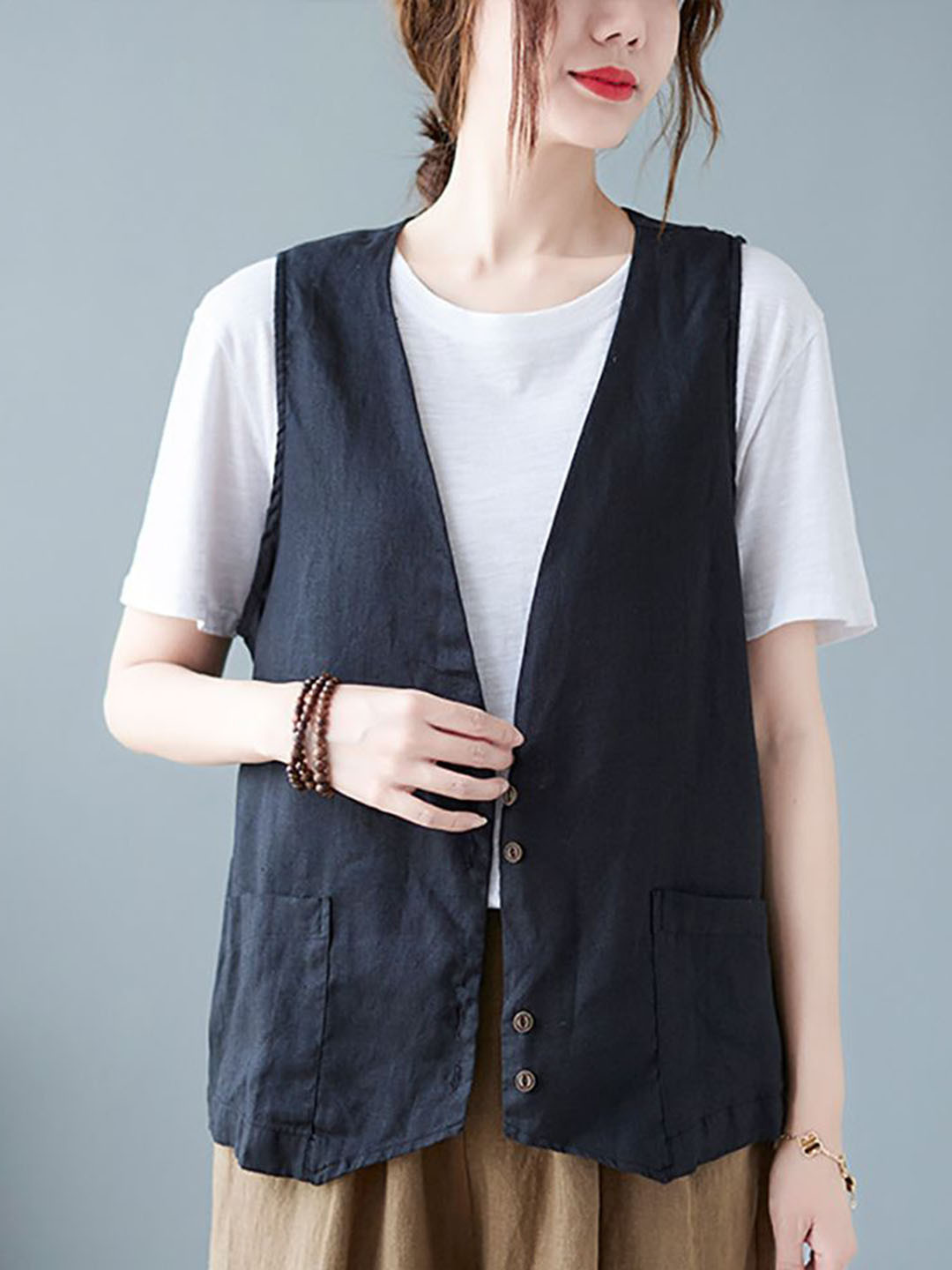 StyleCast x Revolte Women Sleeveless Linen Collarless Tailored Jacket