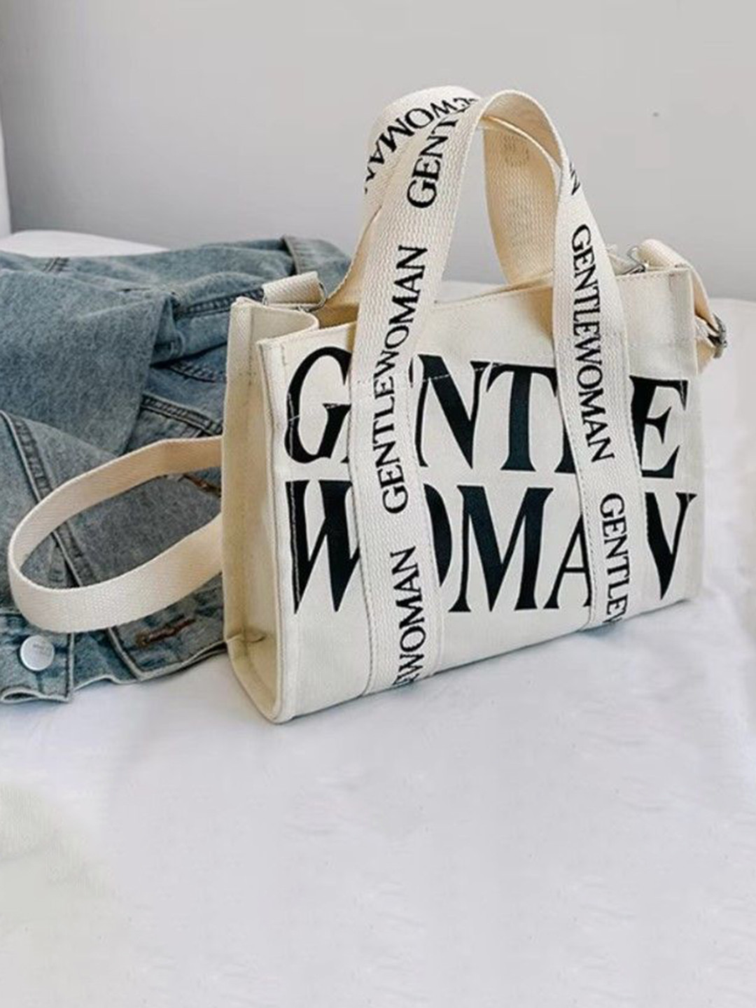 StyleCast Printed Bucket Handheld Bag with Fringed