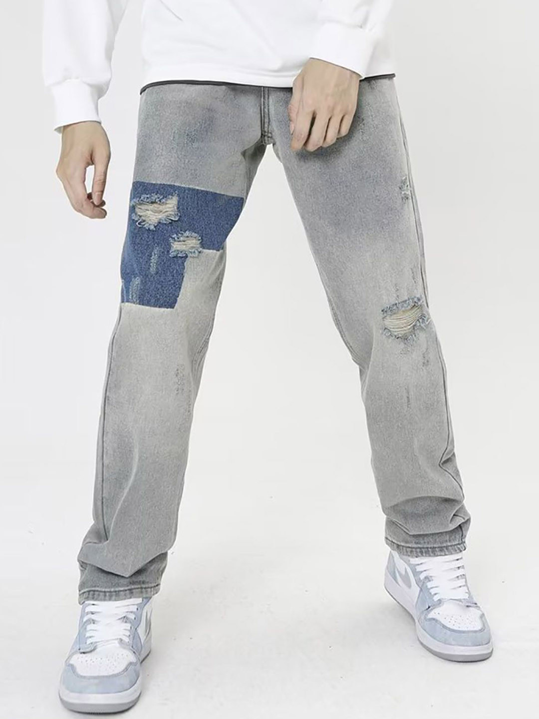 StyleCast x Revolte Men Low Distress Light Fade Jeans