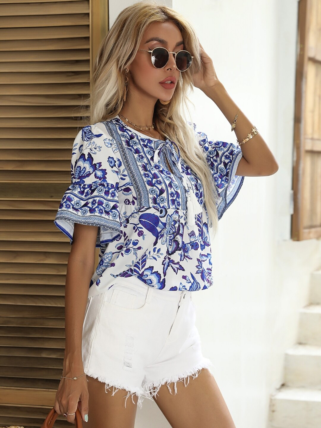 StyleCast Blue Tie-Up Neck Floral Print Flared Sleeve Top