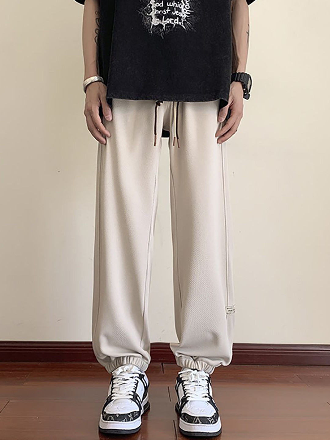 StyleCast x Revolte Men Straight Fit Pleated JSolid Mid-Rise Joggers