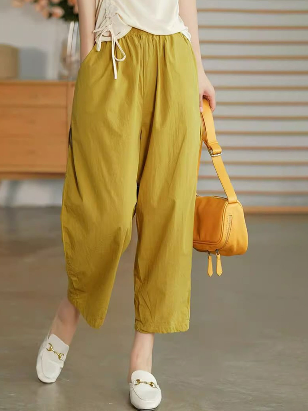 StyleCast Women Yellow Loose Fit Mid-Rise Plain Regular Trousers Trousers