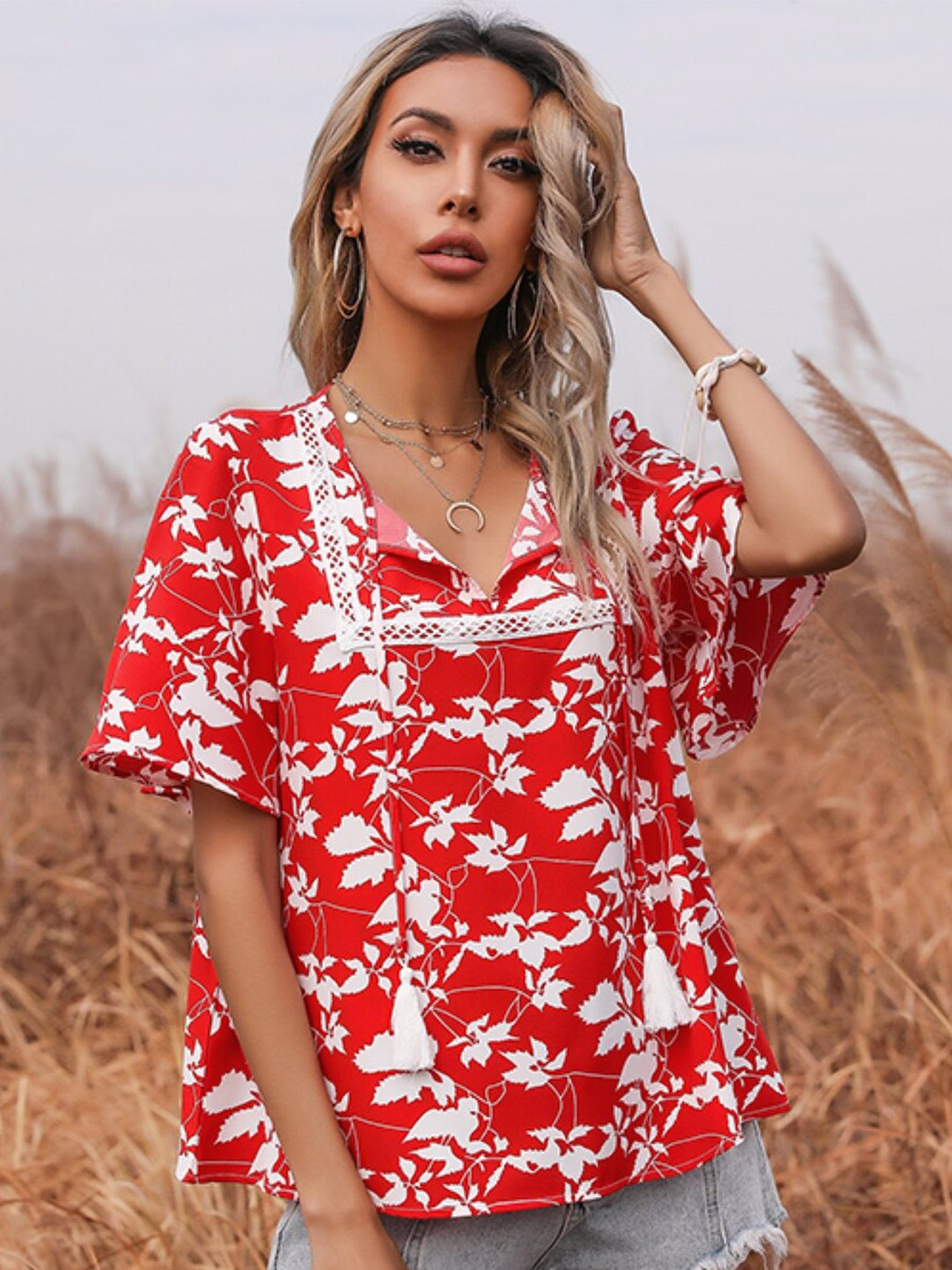 StyleCast Red Floral Printed Flared Sleeves Tie-Up Neck Top