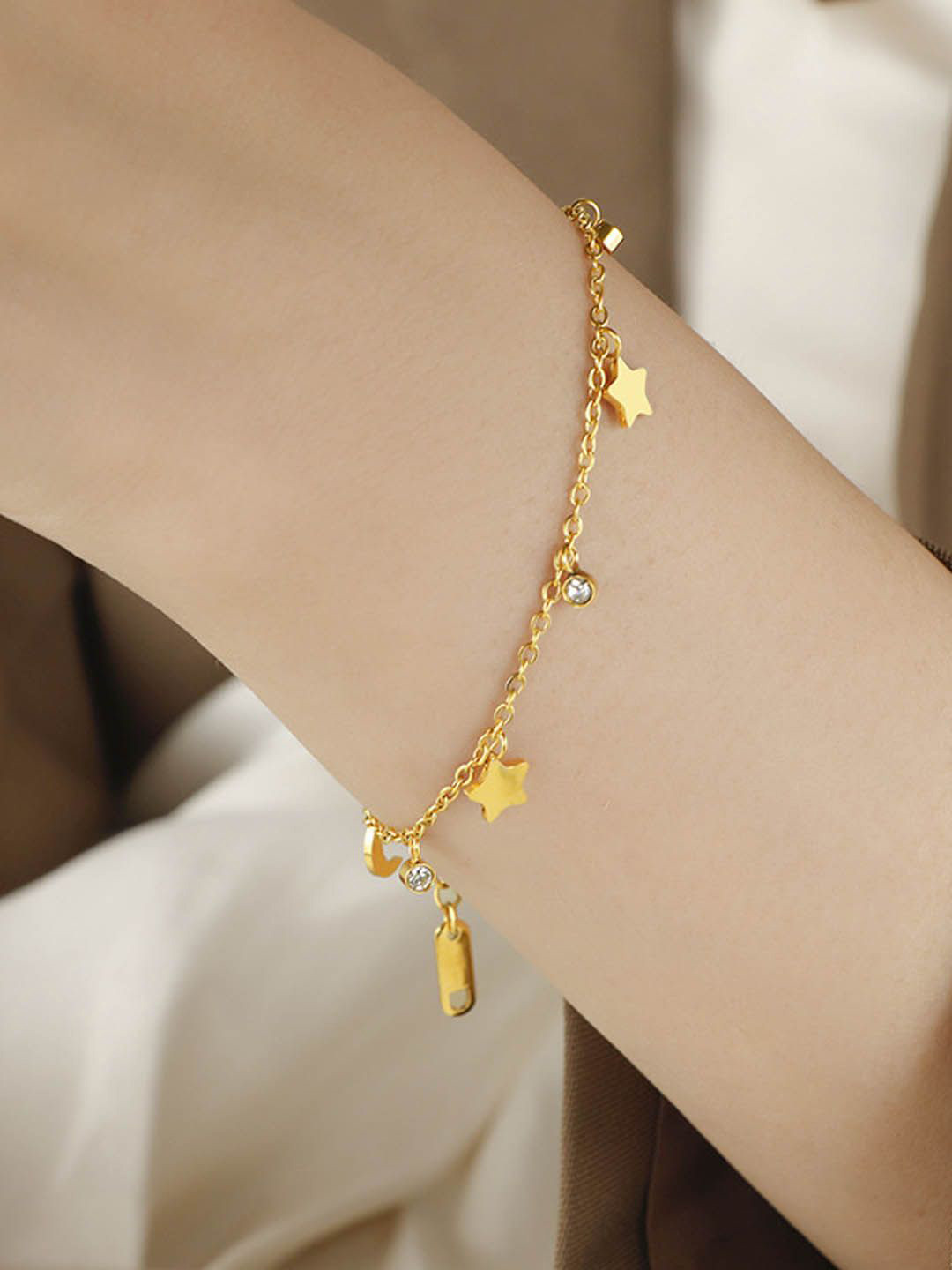 StyleCast Gold-Toned Elegant Stone Studded Star Shaped Link Bracelet