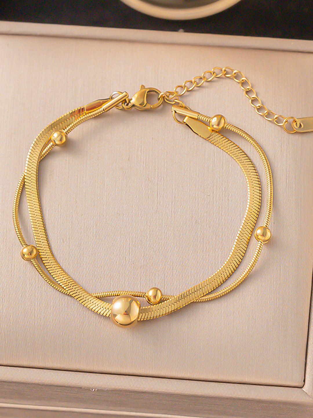 Designs & You Gold-Plated Charm Artificial Beaded Bracelet