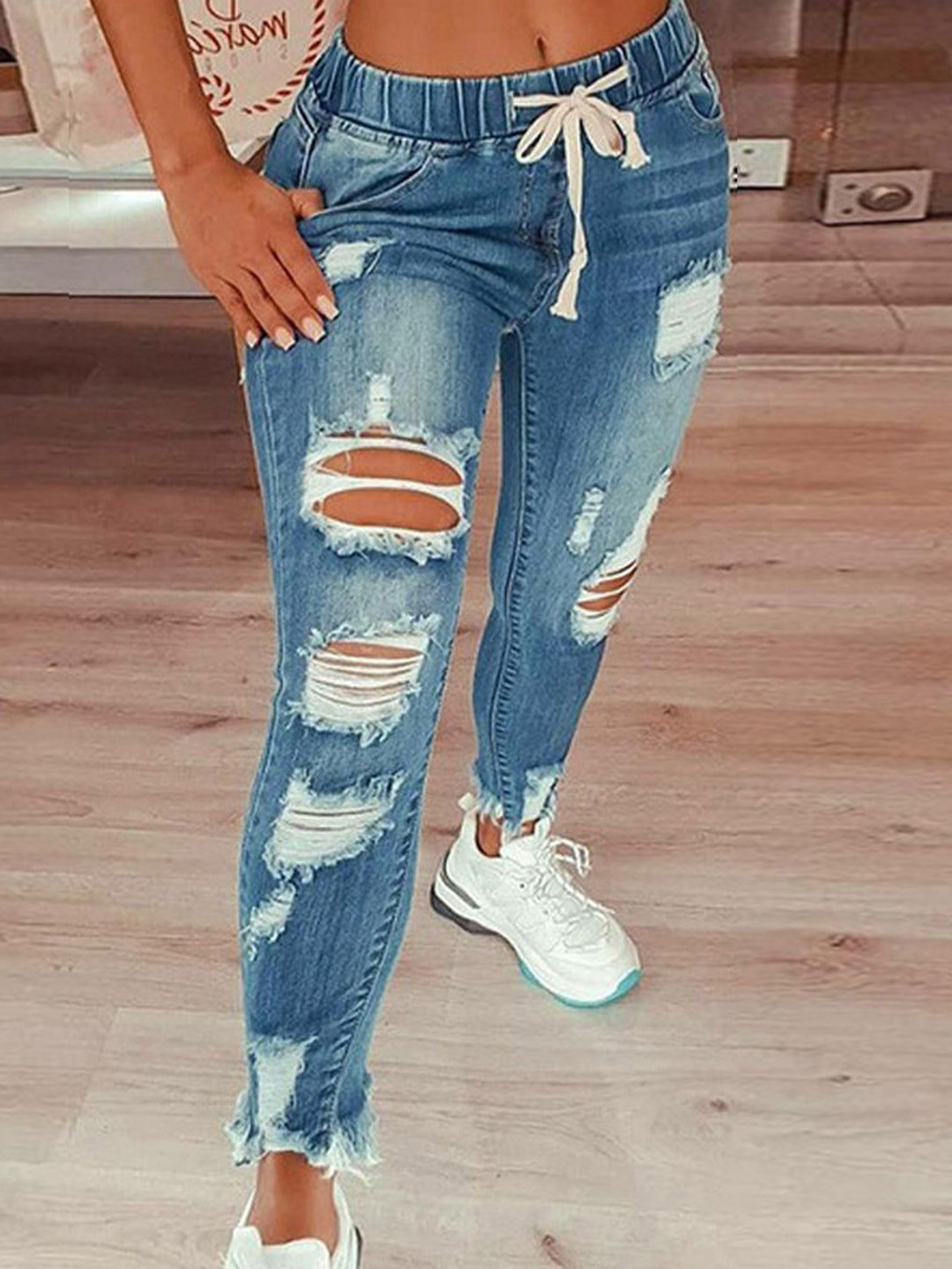 StyleCast Women Slim Fit Highly Distressed Light Fade Stretchable Jeans