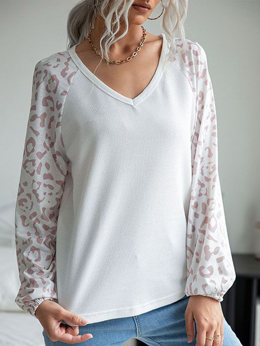 StyleCast Animal Print Solid Top