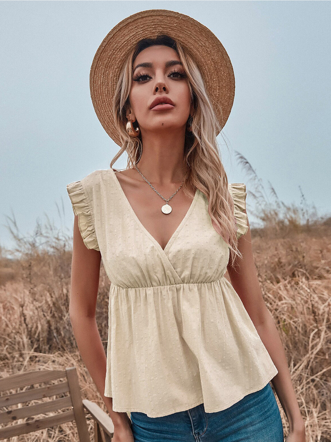 StyleCast Cream V-Neck Flutter Sleeve Empire Top