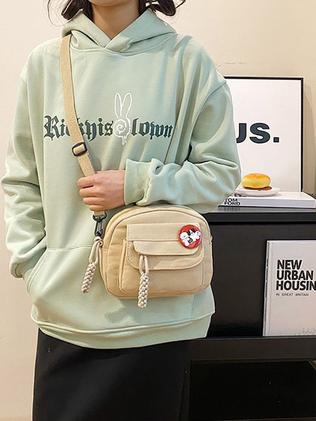 StyleCast x Revolte Swagger Sling Bag