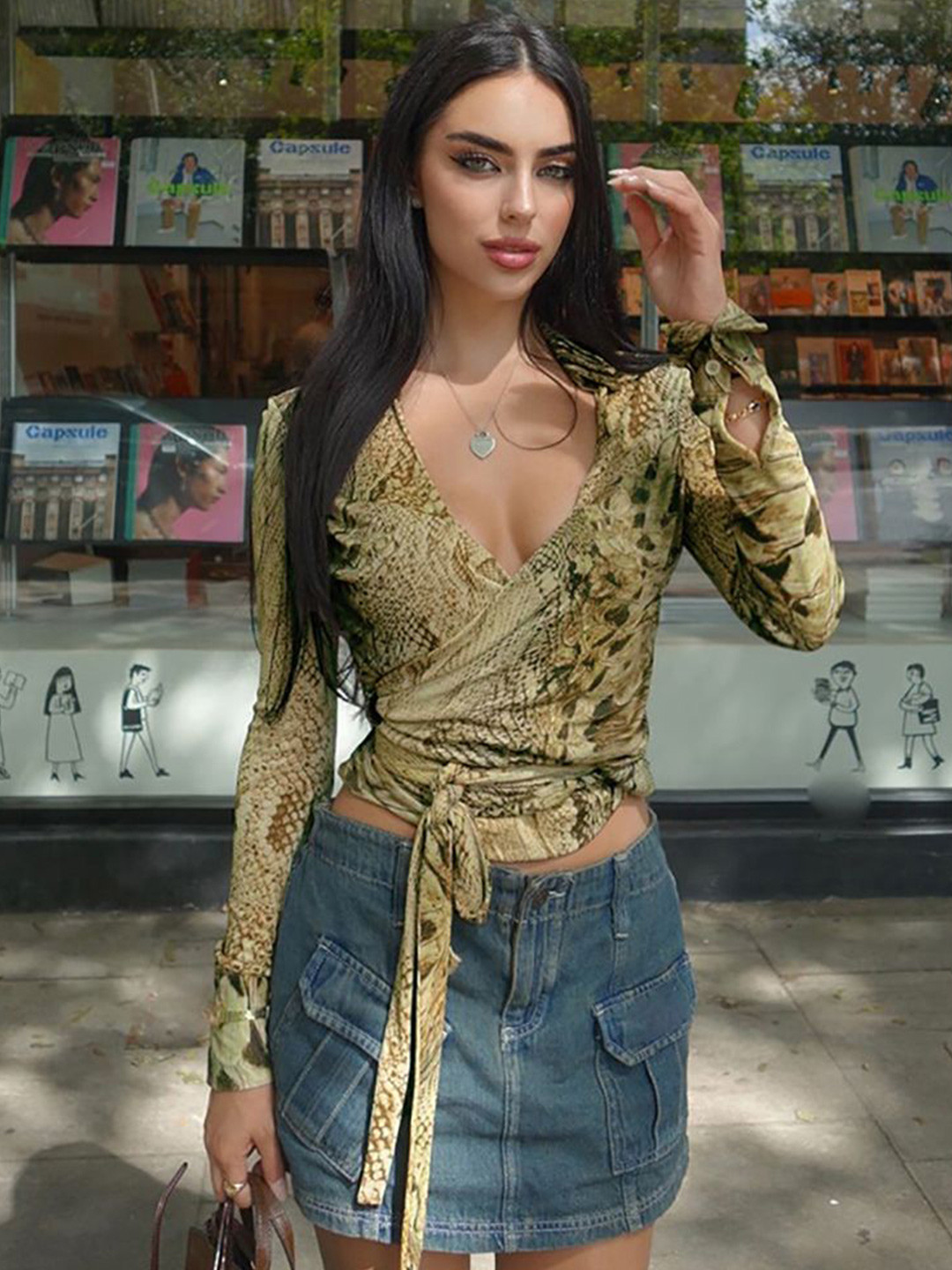 StyleCast x Revolte Abstract V-Neck Peplum Top