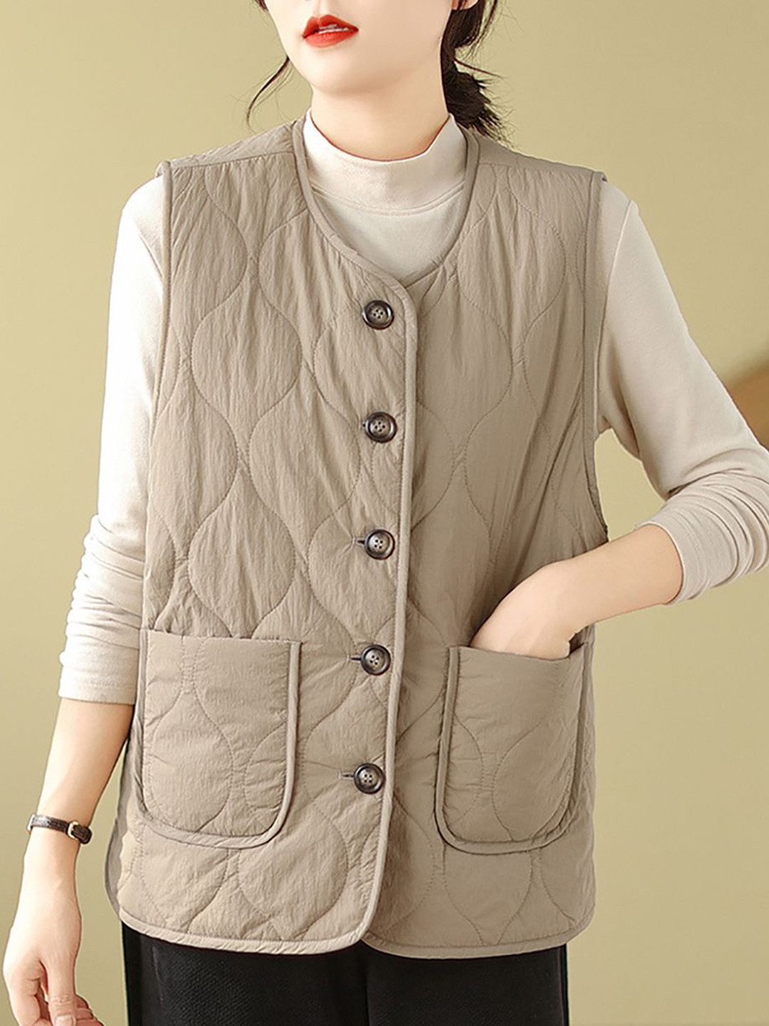 StyleCast x Revolte Brown Quilted Sleeveless Jacket