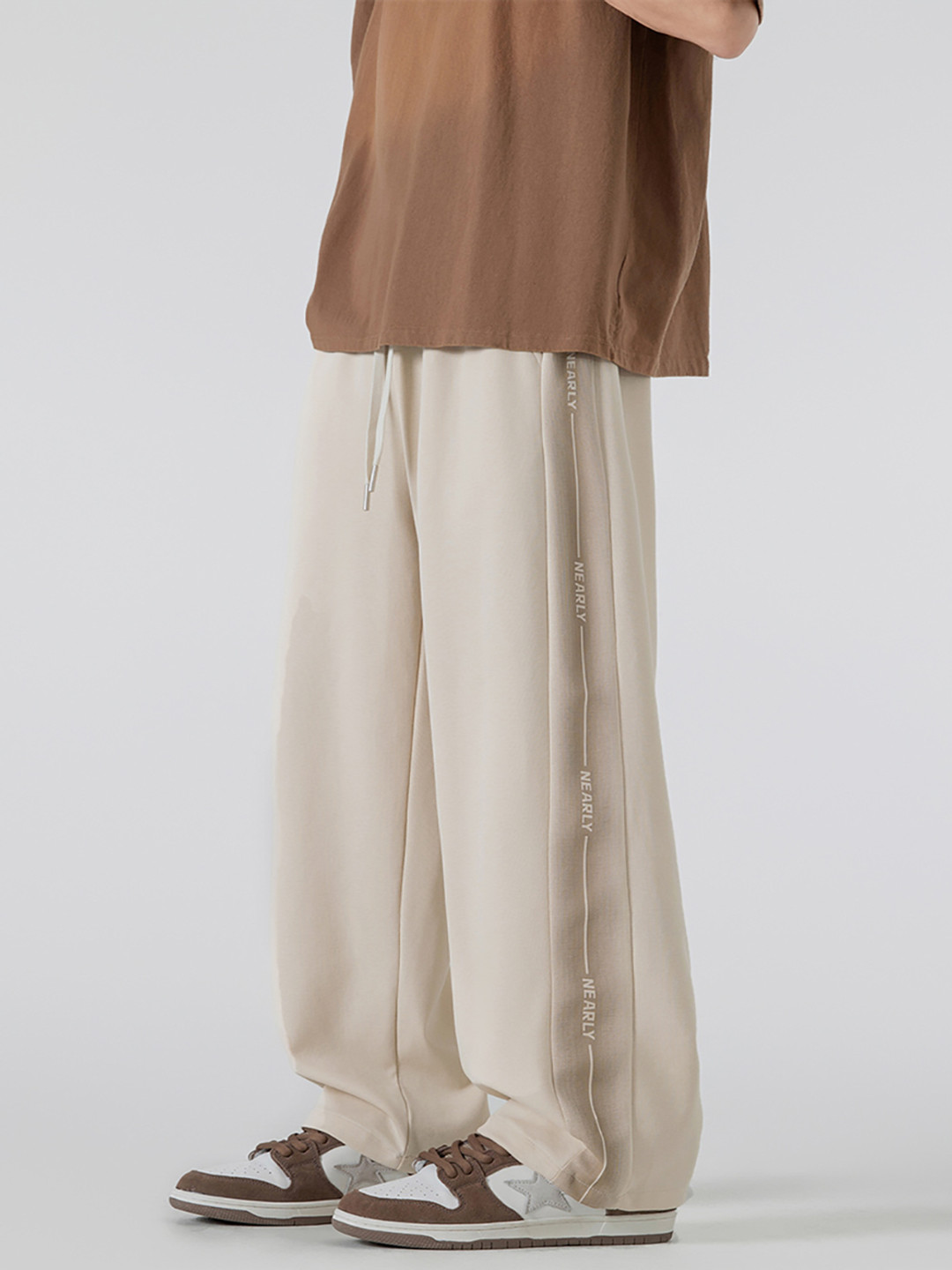 StyleCast x Revolte Men Side Stripes Loose Fit Wide Leg Trousers