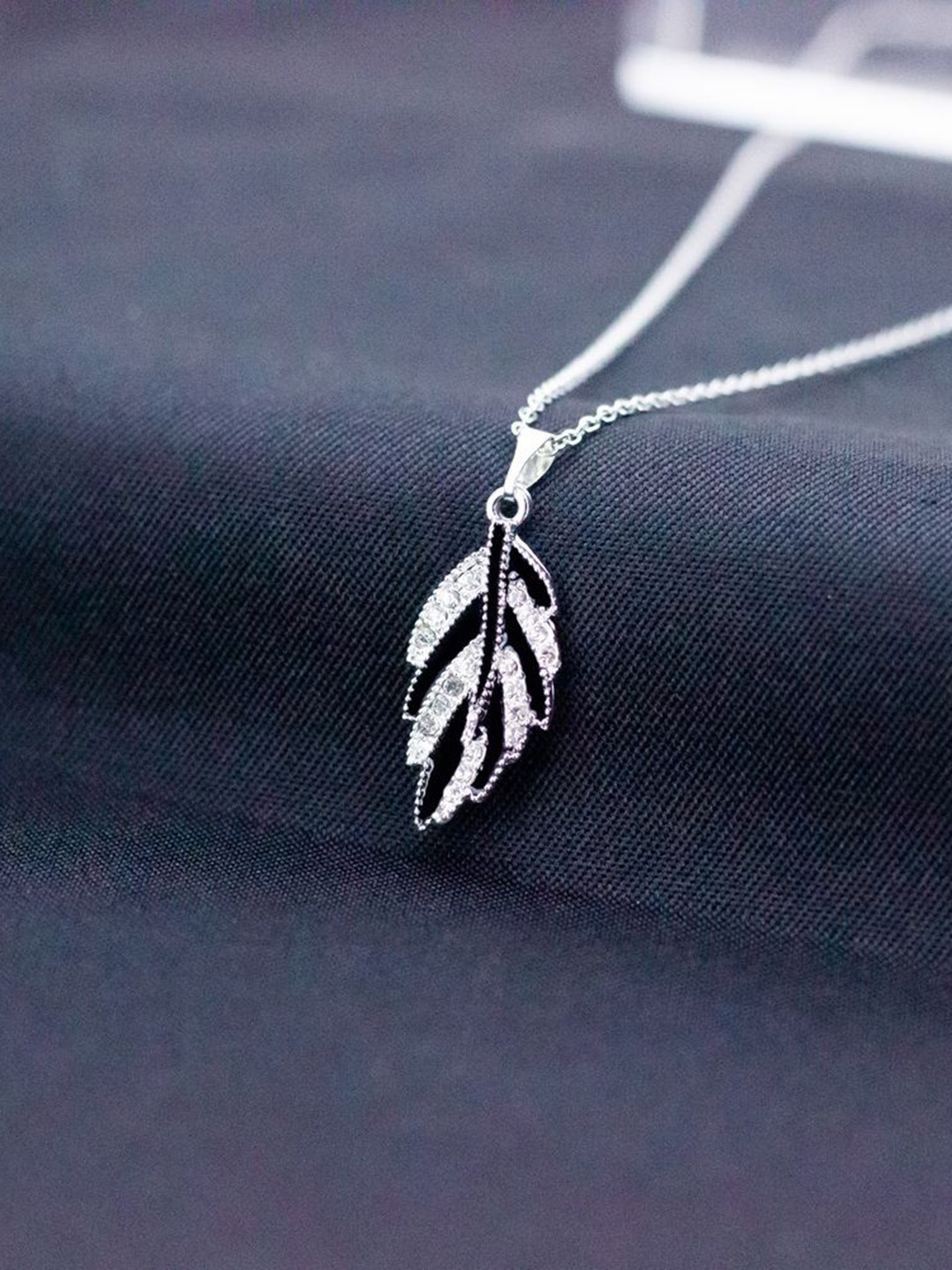 Thrillz Silver-Plated American Diamond Studded Leaf Design Pendant with Chain
