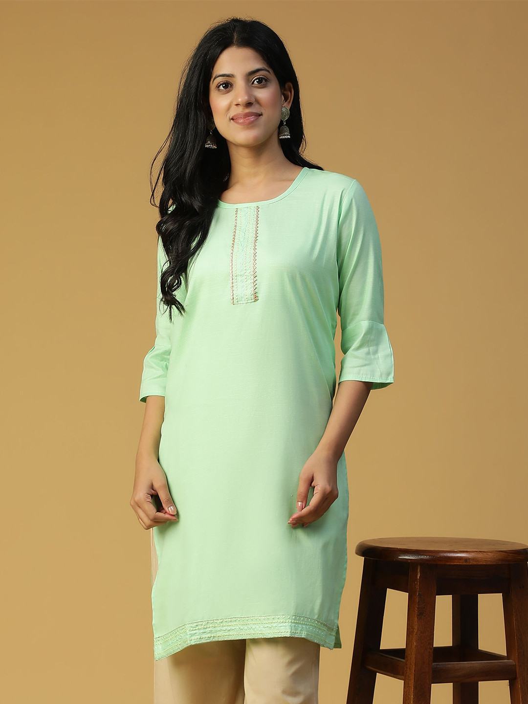 FOURFOLDS Women Solid Pure Cotton Straight Kurti