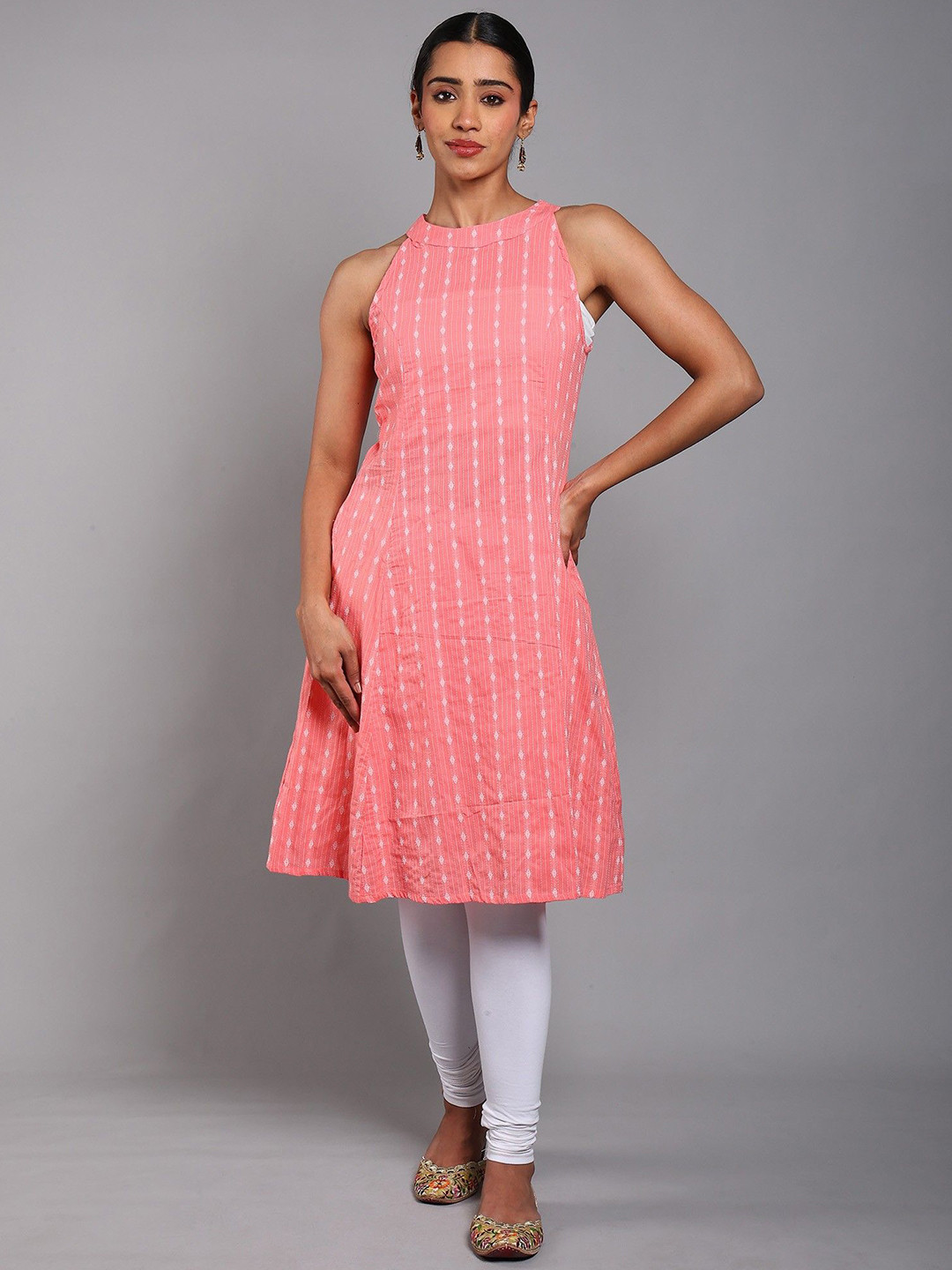 Exotic India Women Cotton Sleeveless Straight Kurti with Woven Pattern and Side Pockets