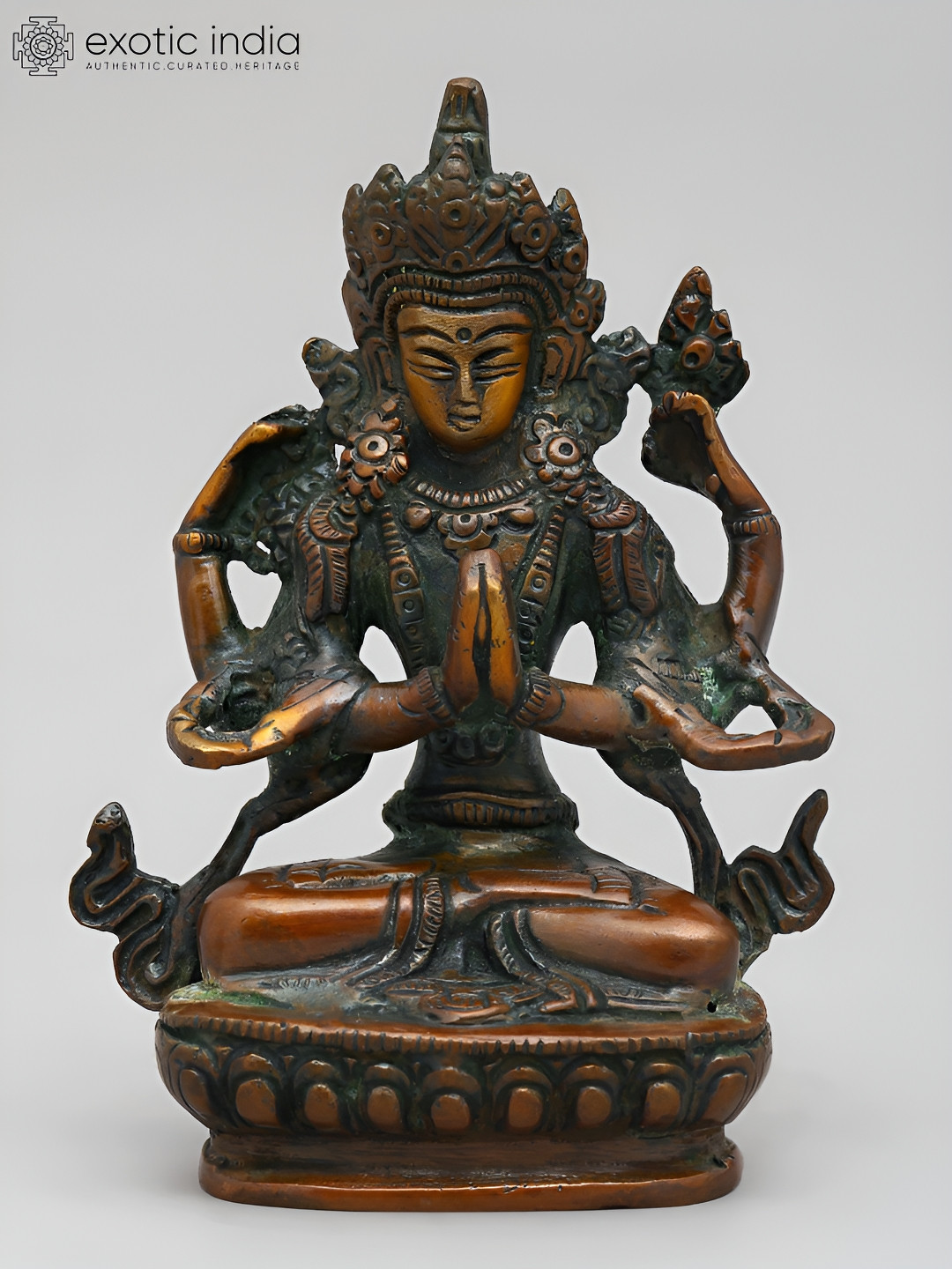 Exotic India Tibetan Buddhist Deity Chenrezig Green Brass Metallic Prayer Room Small Showpiece - 5.5 Inches