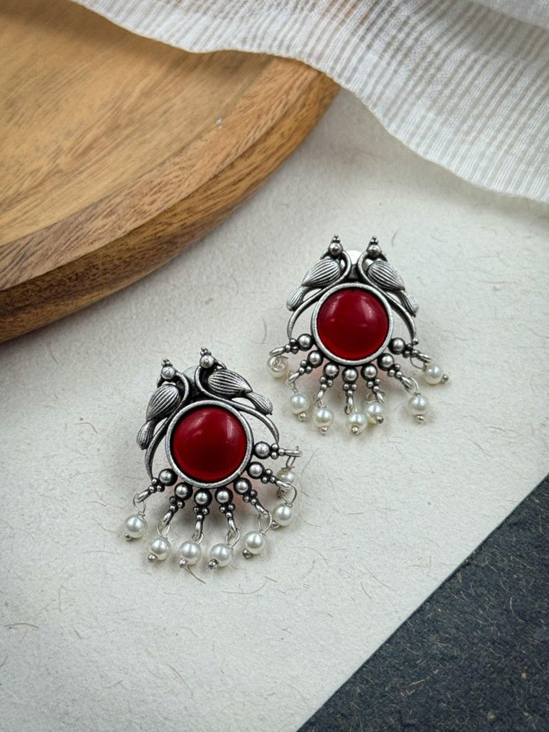 NAMAN ARTS Gold-Plated Stones Studded and Beaded Animal Shaped Oxidised Drop Earrings