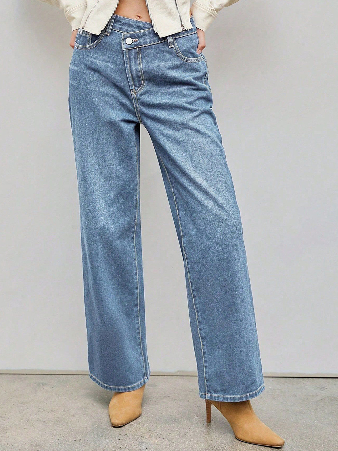 bebe Light Wash Relaxed Fit Asymmetrical Waist Jeans