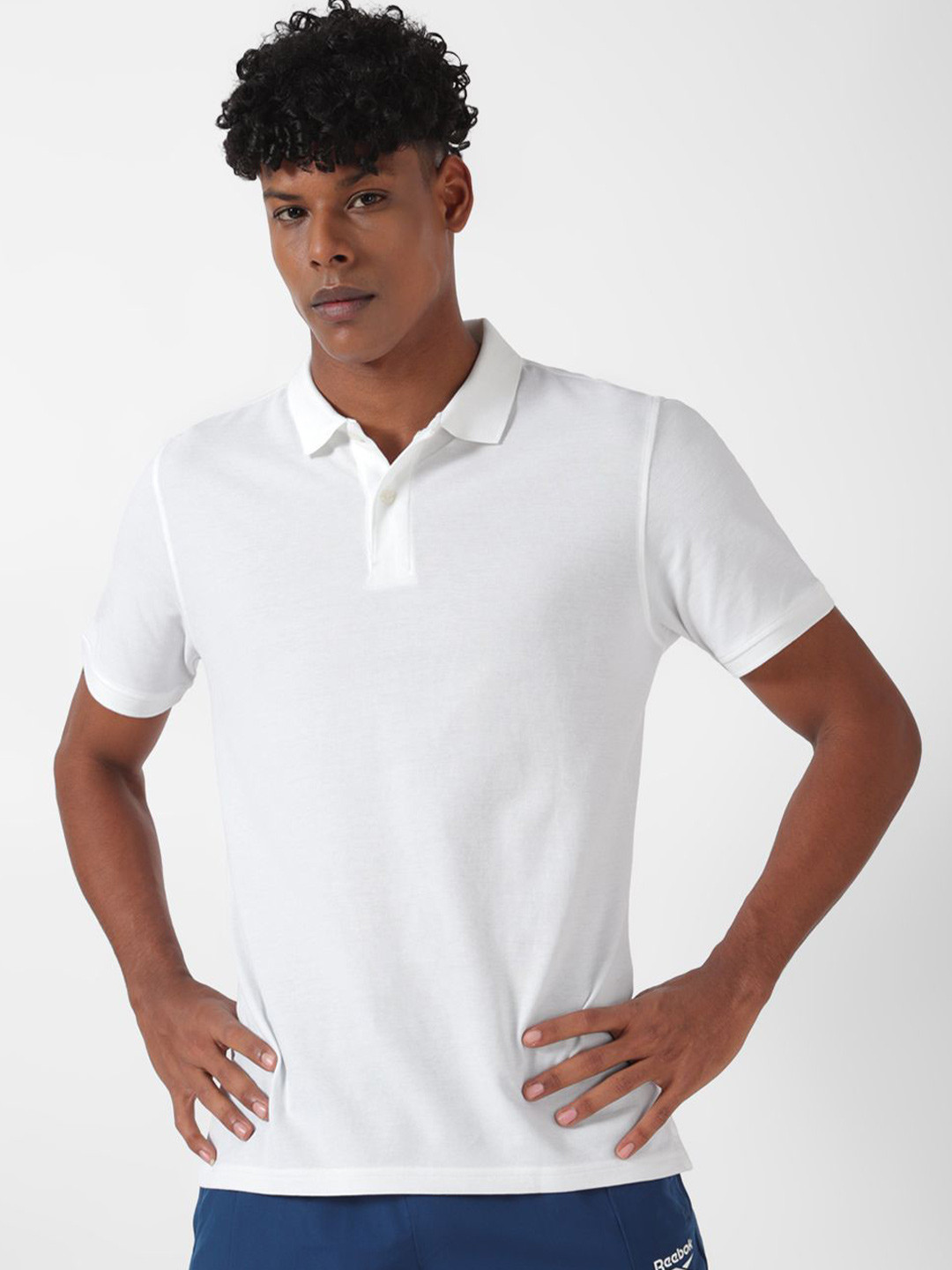 Reebok Men Solid Polo Collar T-shirt