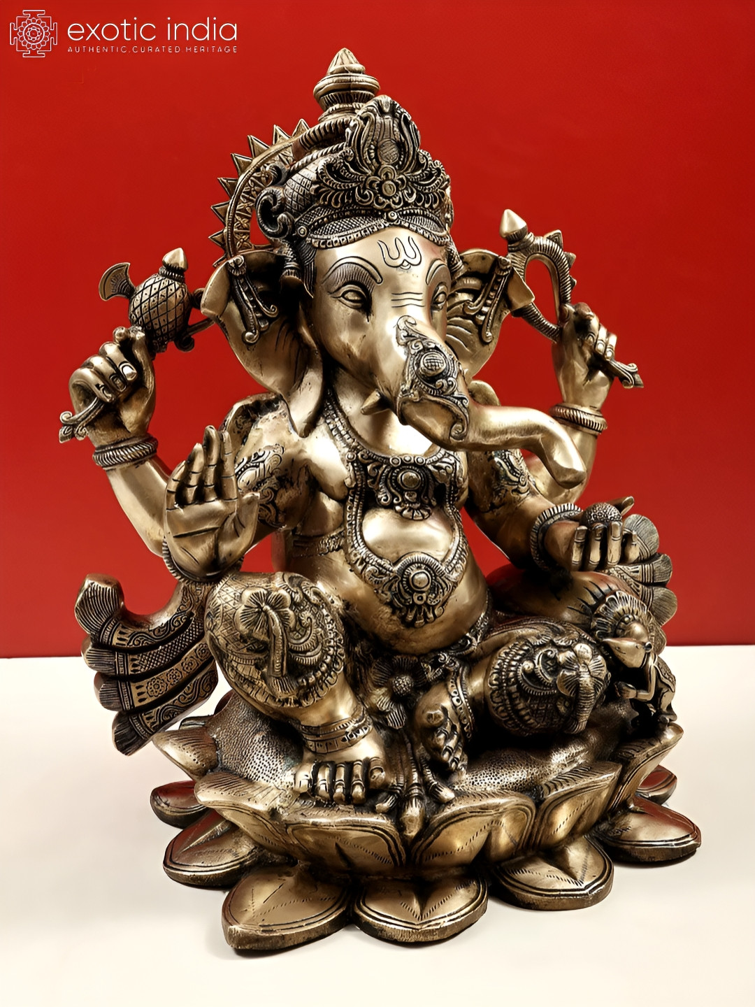 Exotic India Lord Ganesha Seated in Easy Posture Gold Brass Metallic Prayer Room Large Showpiece - 21 Inches
