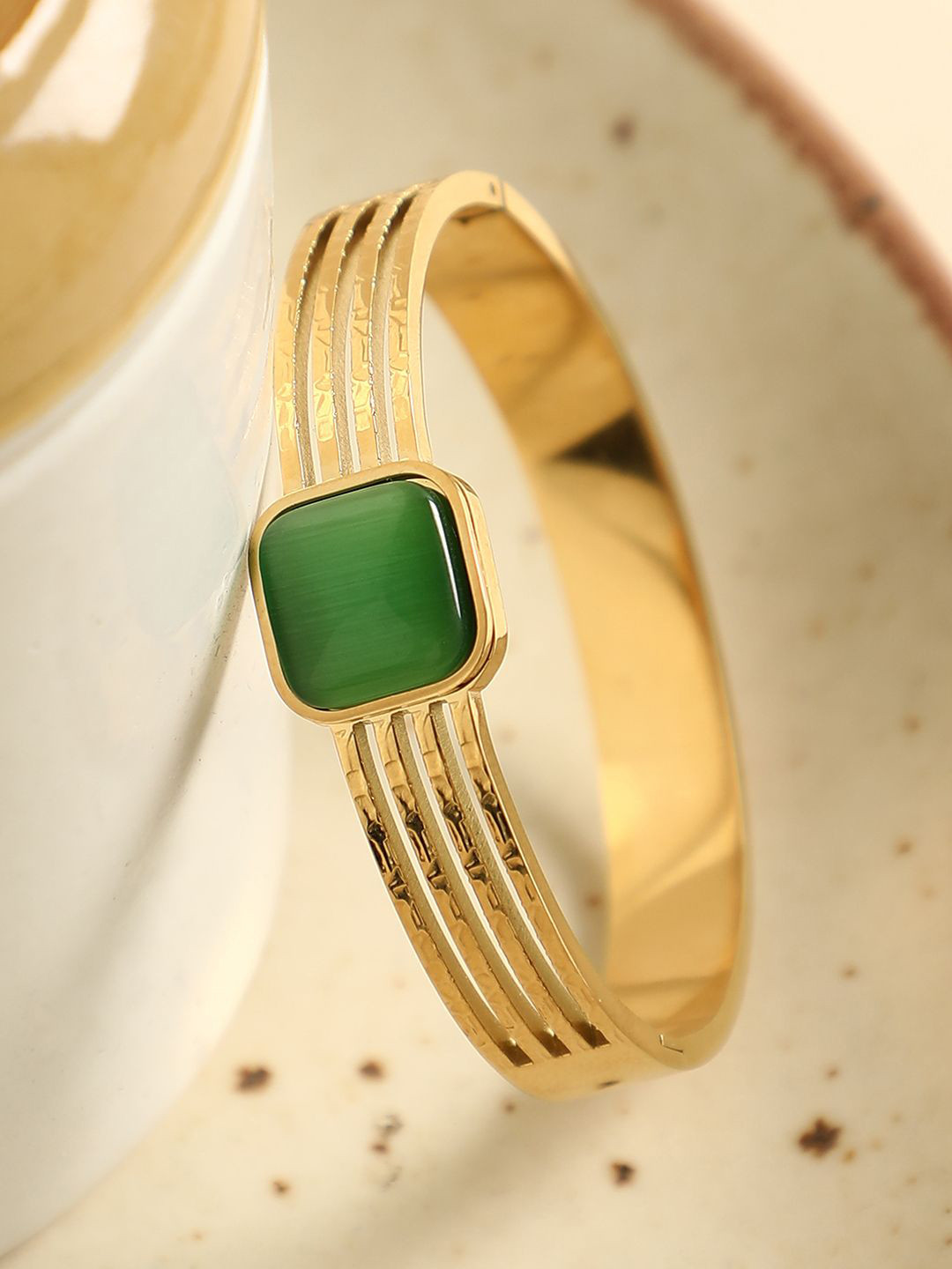 SOHI Women Gold-Plated Stone Studded The Quad Bangle-Style Bracelet