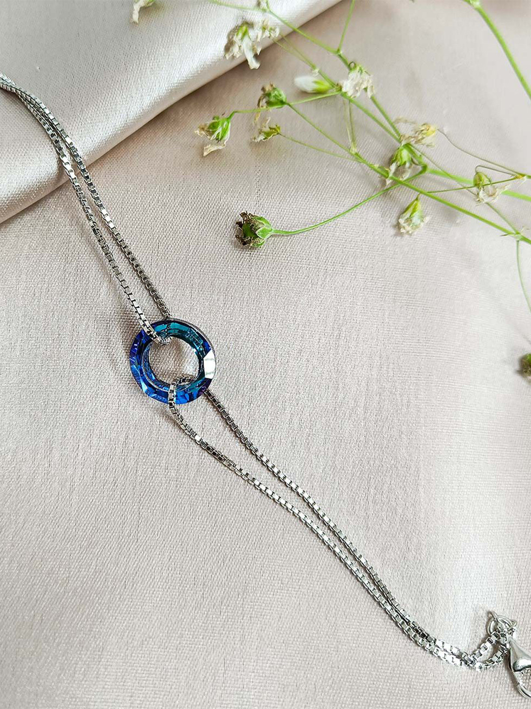 INARI SHINES 925 Silver Rhodium Plated Bracelet with Blue Crystal