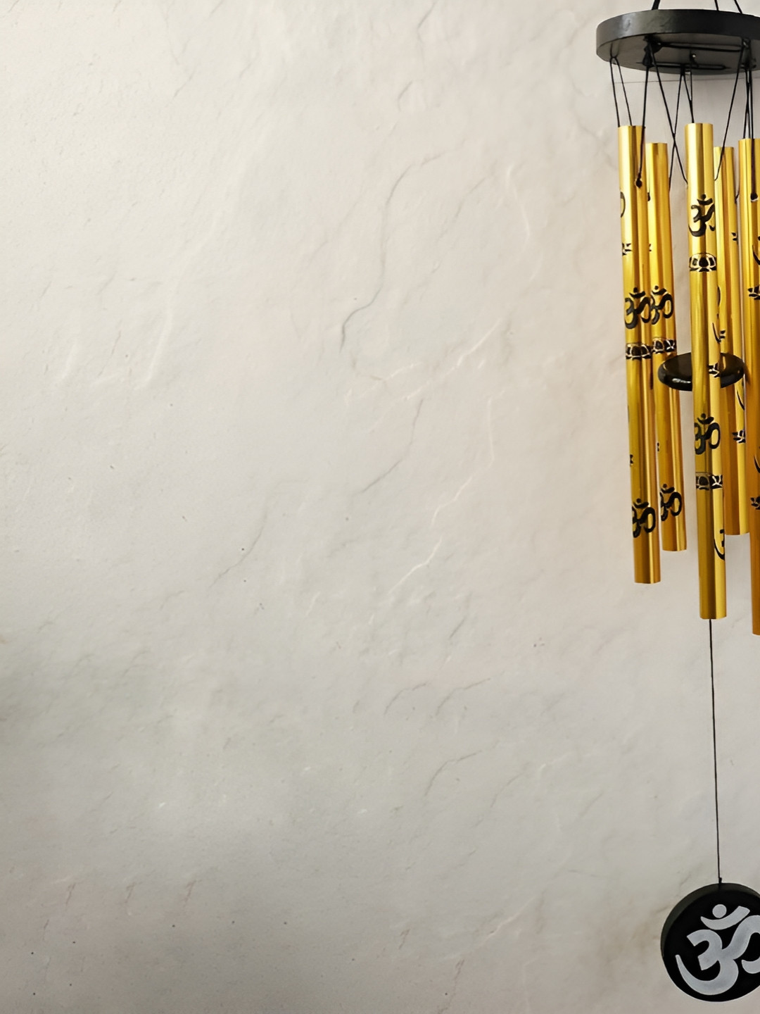 The Spiritual Living Black 5-Pipes 5-Pipes Om Windchime