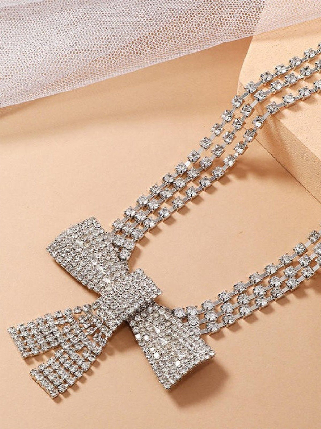 ISHKAARA Rhodium-Plated Crystal Studded Sparkling Bow Necklace