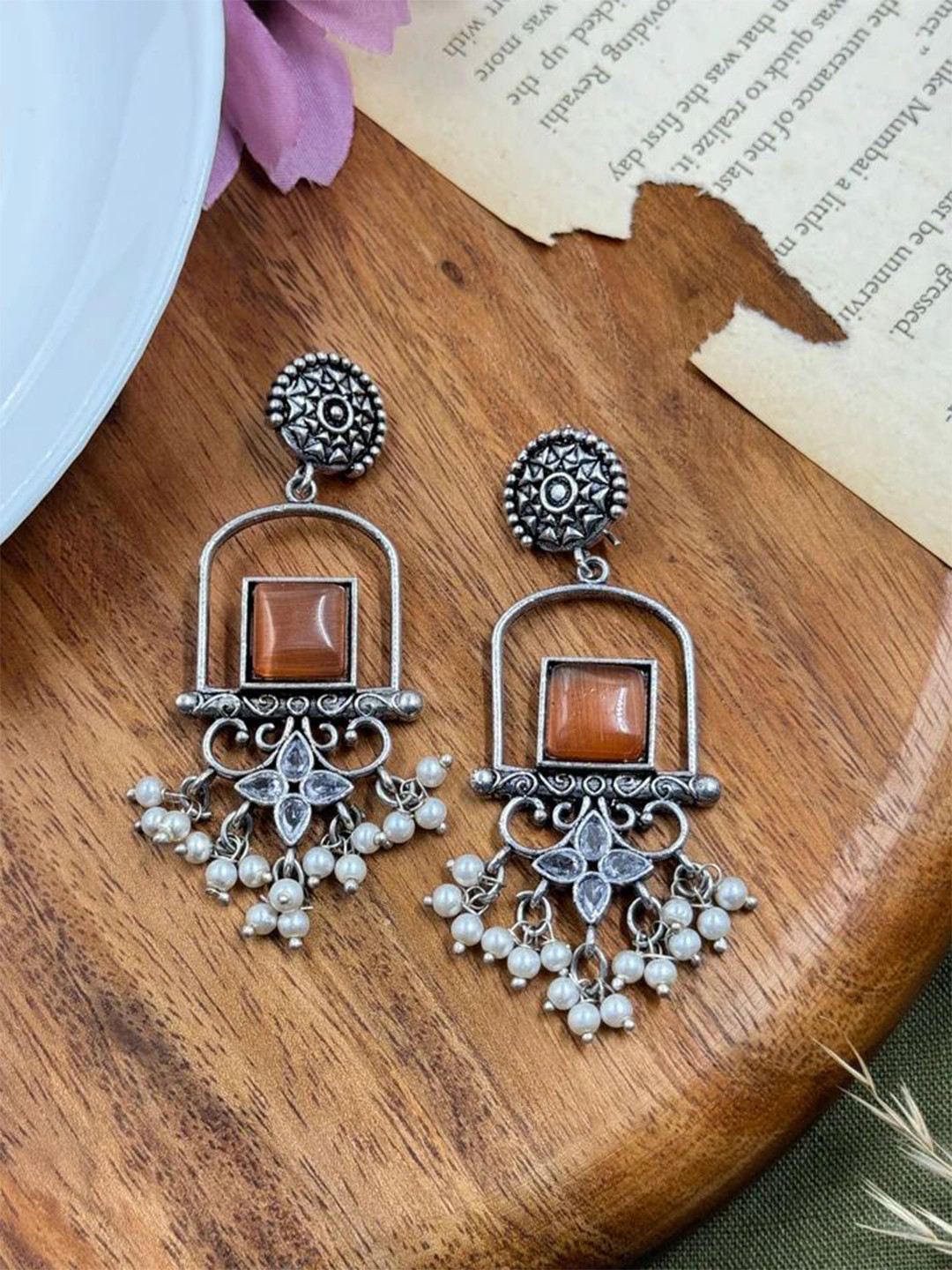 NAMAN ARTS Silver-Plated Artificial Stones Studded Contemporary Drop Earrings
