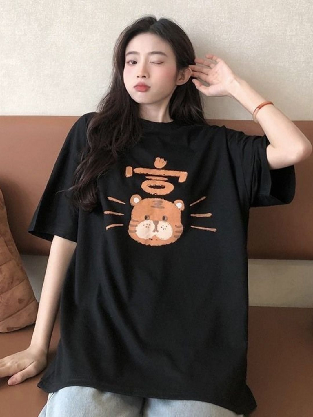 StyleCast Black & Orange Graphic Printed Oversized Cotton T-shirt