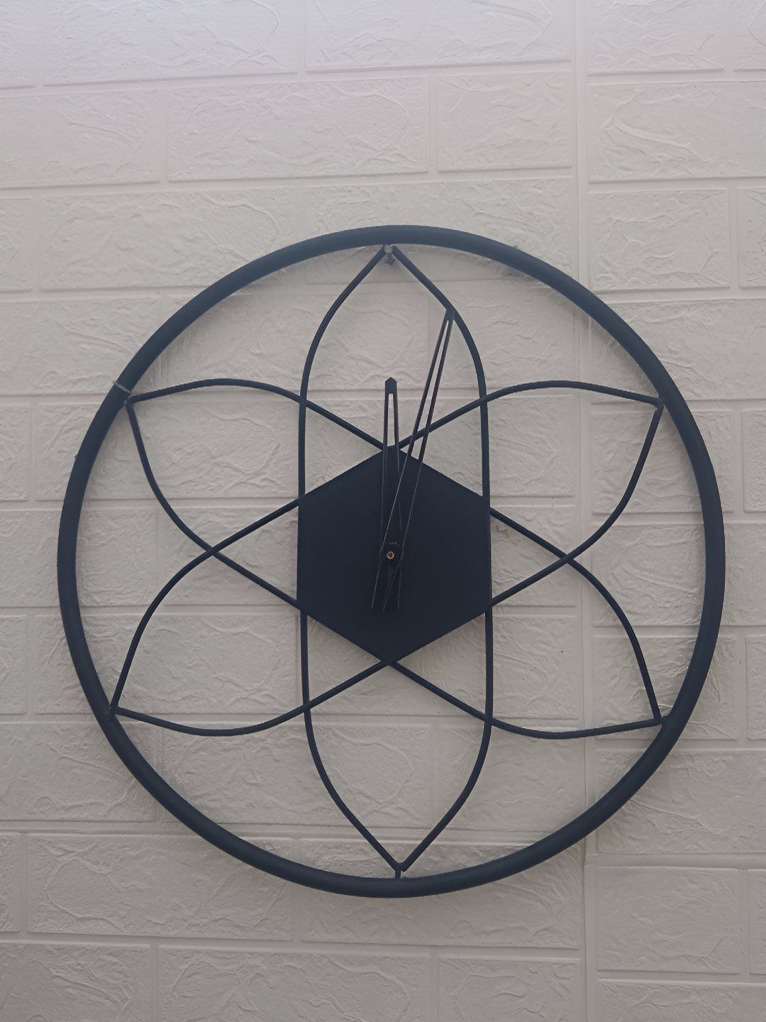 Nutts Black Metal Contemporary Round Shaped Wall Clock