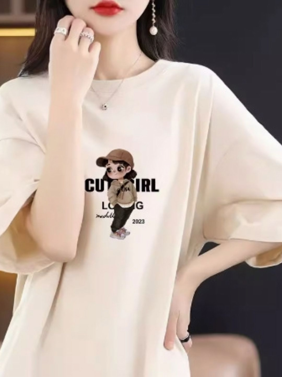 StyleCast Cream Coloured & Black Graphic Printed Oversized T-shirt