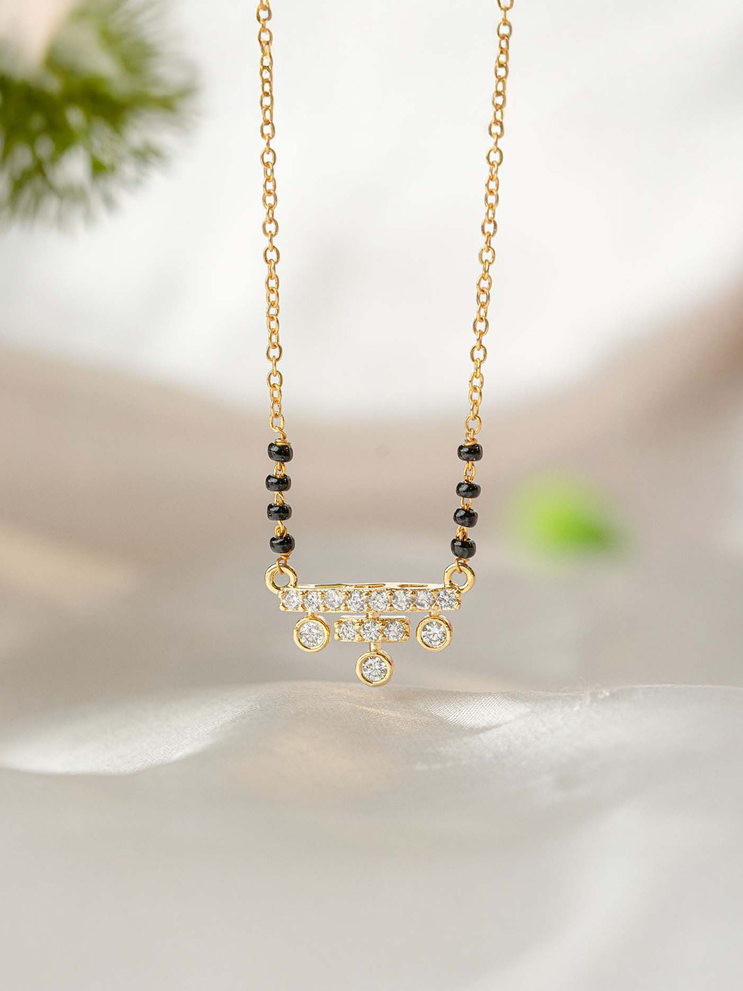 Mesmerize Stainless Steel Gold-Plated Trinity Vati Mangalsutra