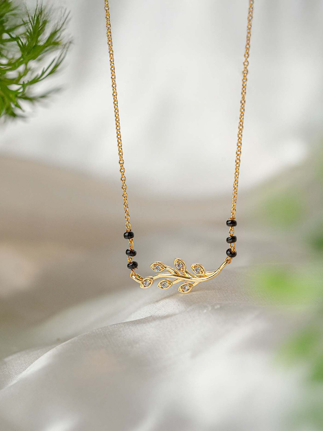 Mesmerize Stainless Steel Gold-Plated Artificial Stones and Beads Elegant Leaf Mangalsutra