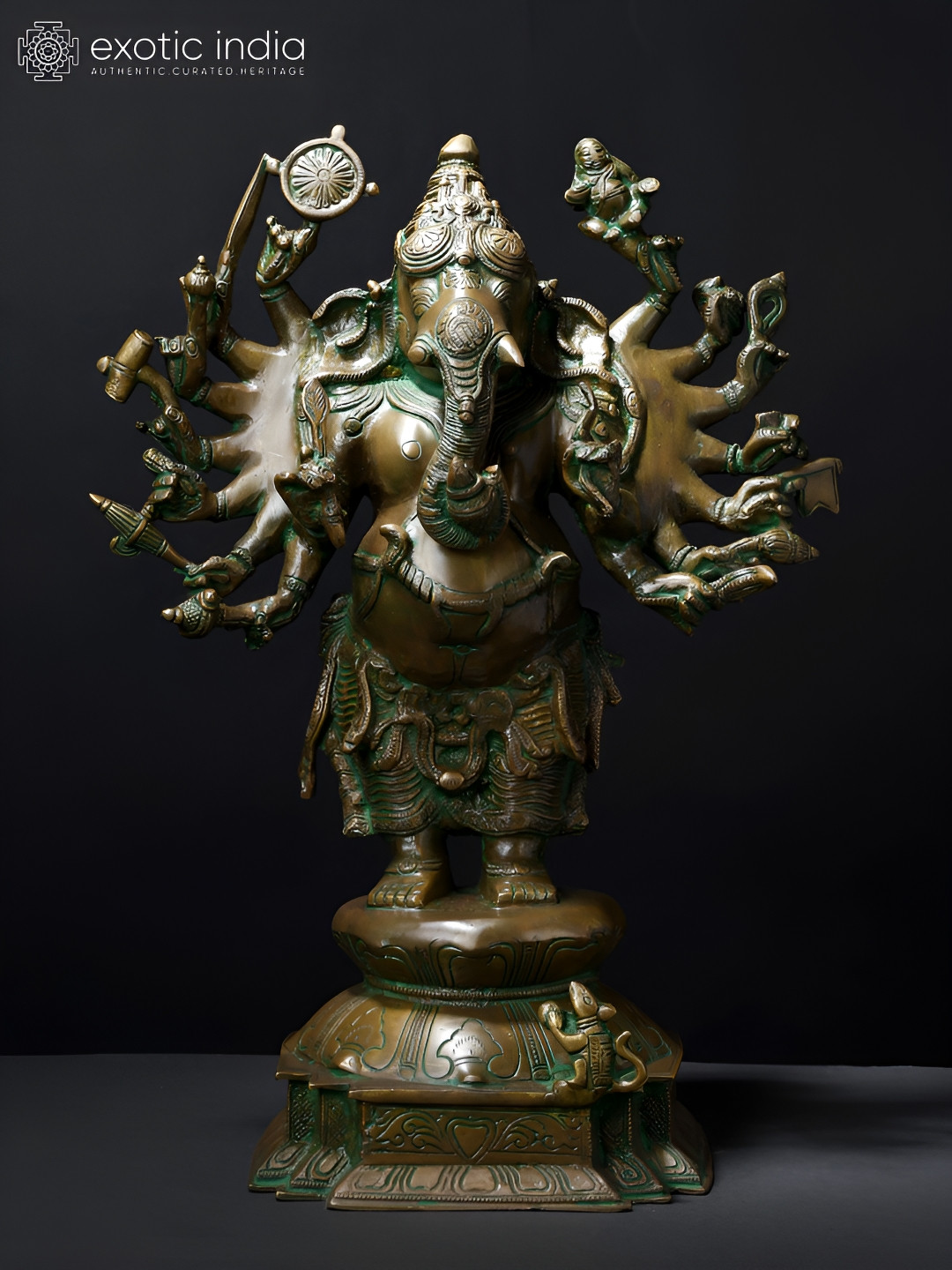 Exotic India Sixteen Armed Vira-Ganesha Brown Brass Metallic Prayer Room Medium Showpiece - 19 Inches