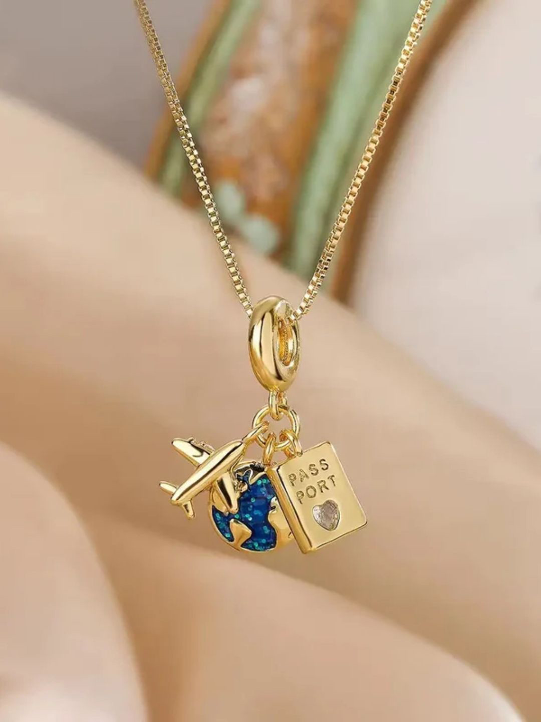 FAB COUTURE Gold-Plated Stainless Steel Waterproof Globetrotter Pendant With Chain