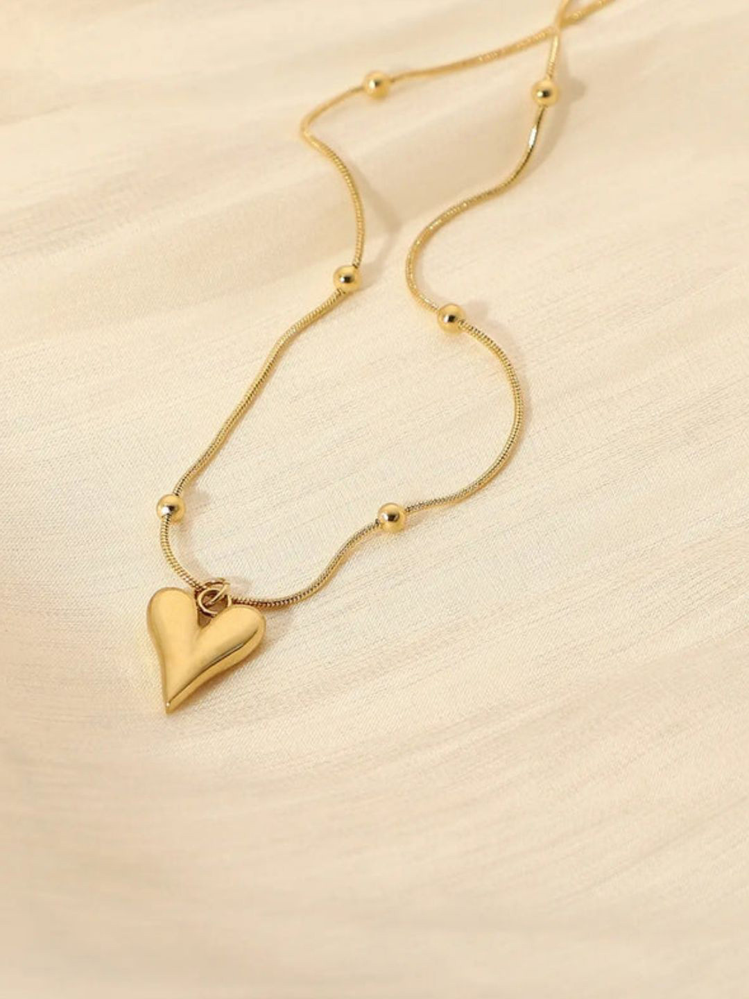 FAB COUTURE Gold-Plated Stainless Steel Melting Heart Pendant with Chain