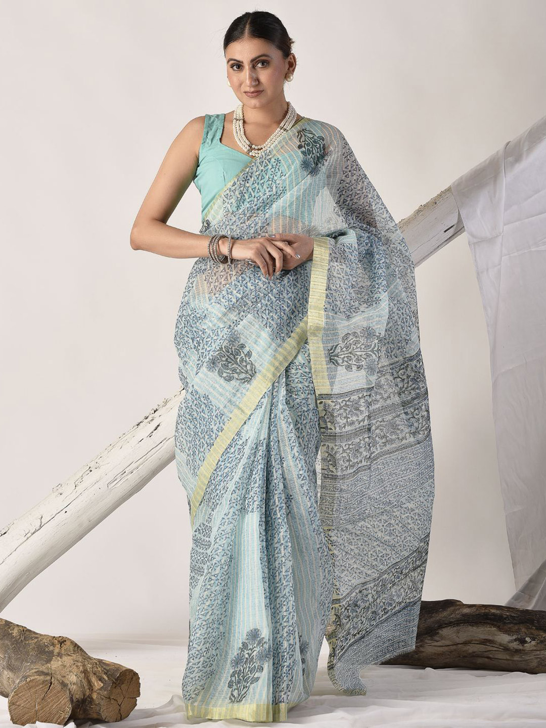 sutra attire Turquoise Blue Block Printed Pure Kota Doria Floral Saree