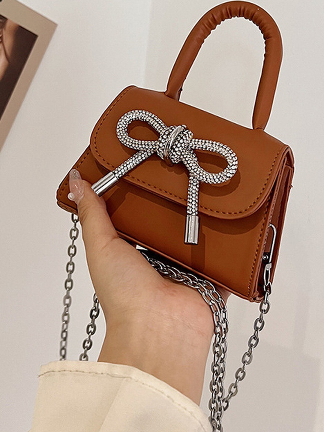 CORSICA Women Brown PU Handheld with Bow Detail Bag