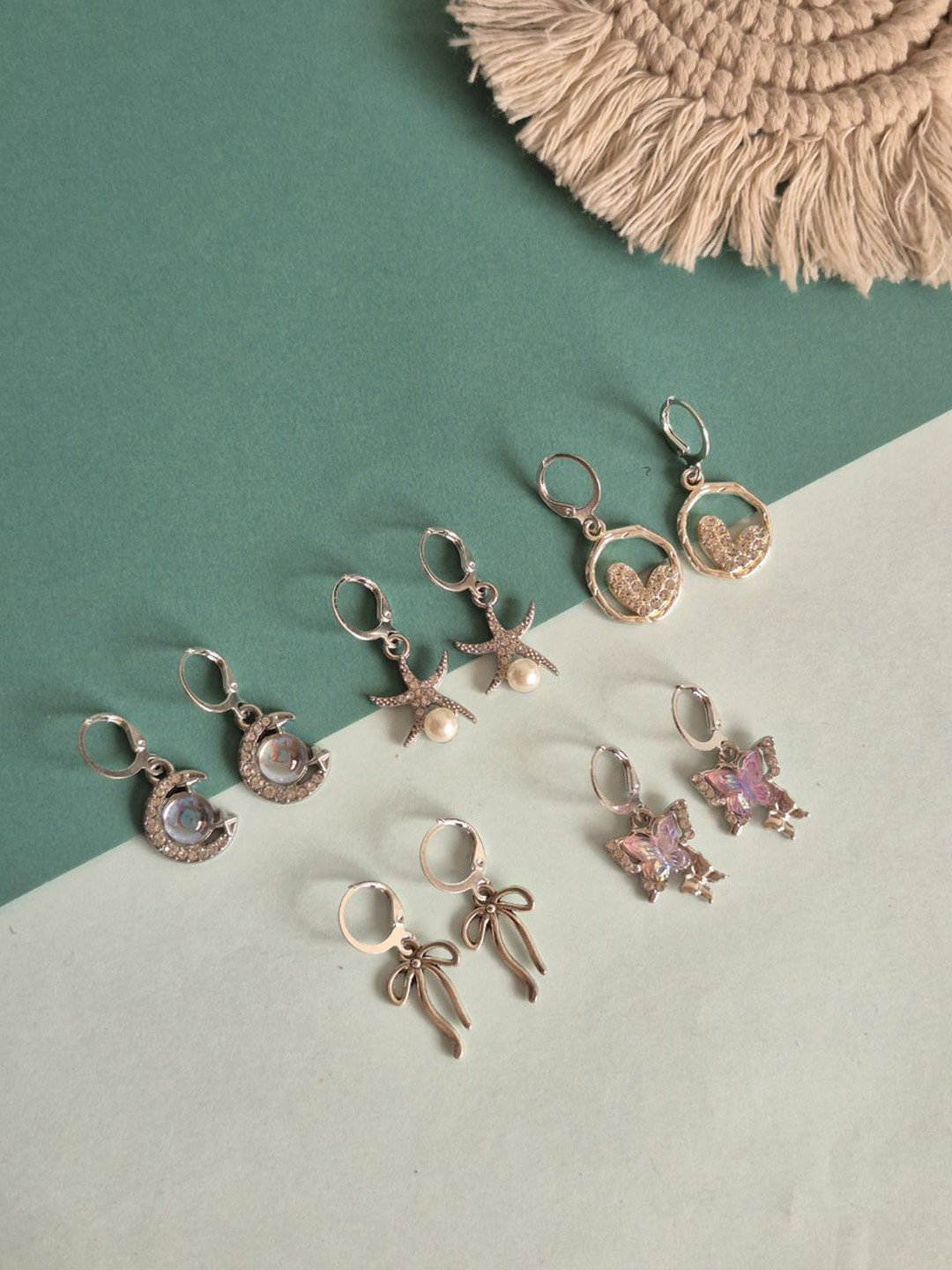 Octagon hub Set Of 5 Silver-Plated Bow Shaped Drop Earrings