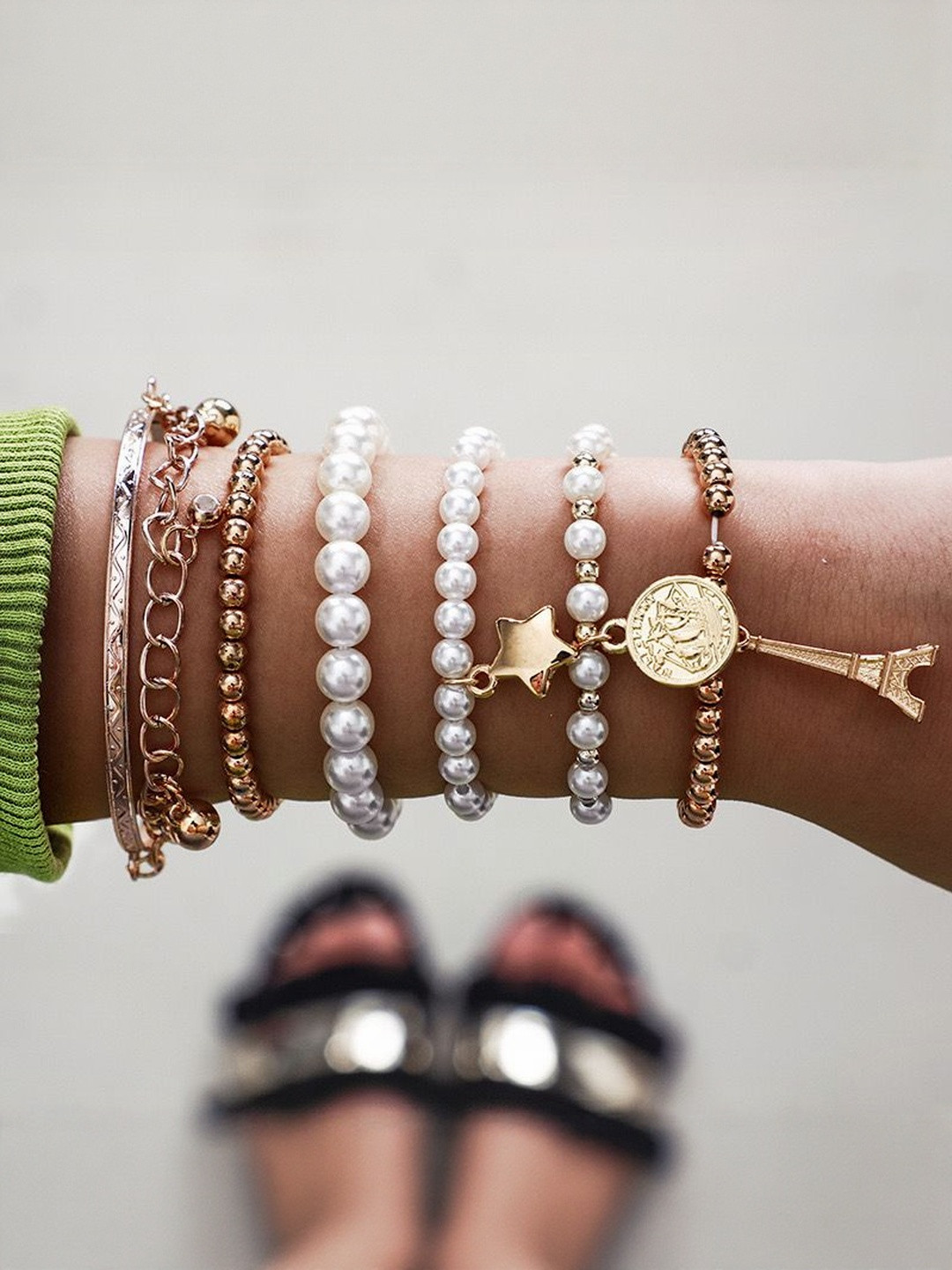 DressBerry Women Gold Plated Pearl Studded Multistrand Bracelet