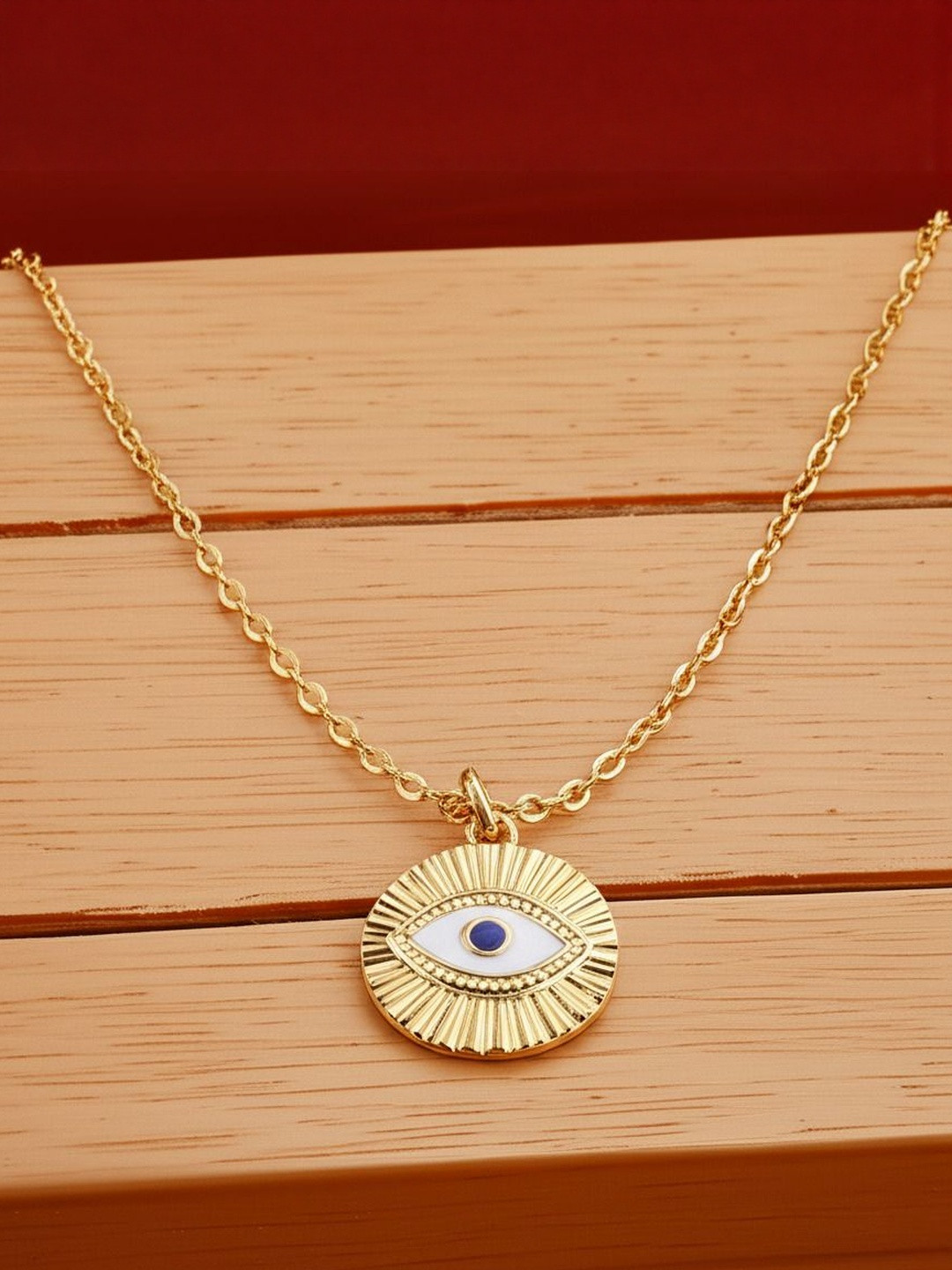 DressBerry Women Single Layered Blue Evil Eye Round Pendant