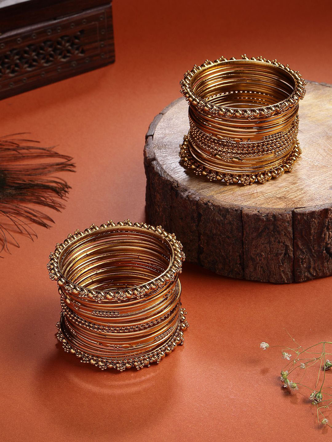 Sukkhi Set Of 40 Gold-Plated Ghungroo Studded Oxidised Bangles
