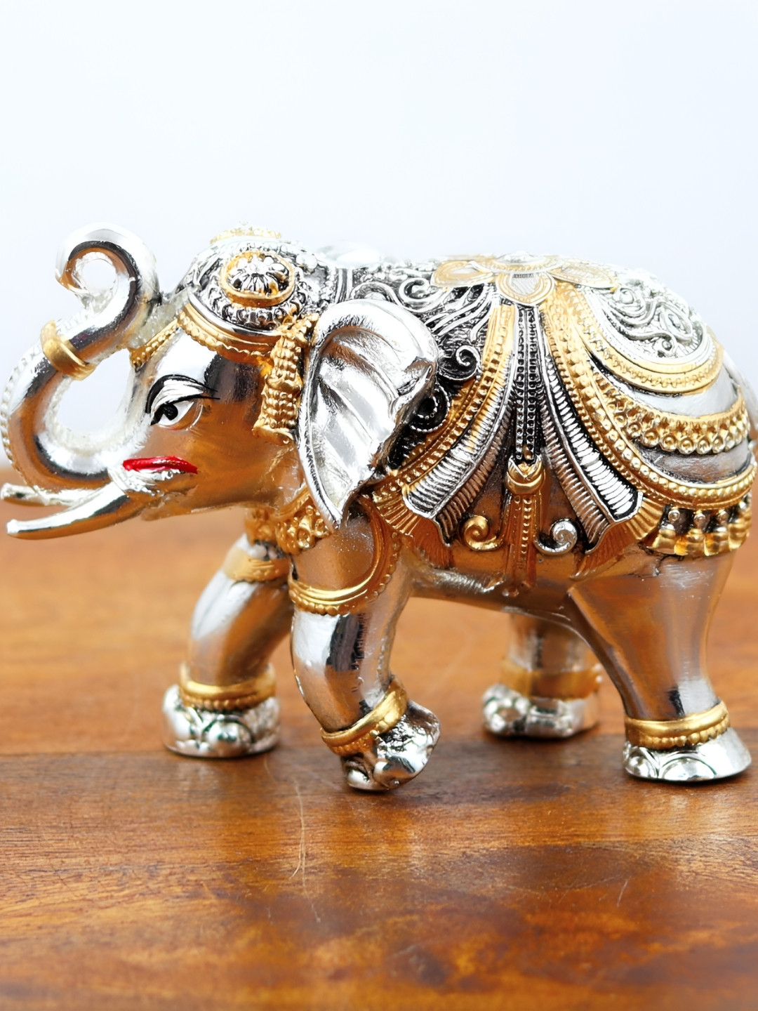 INTERNATIONAL GIFT Silver-Toned & Gold-toned Elephant Statue Resin Showpiece