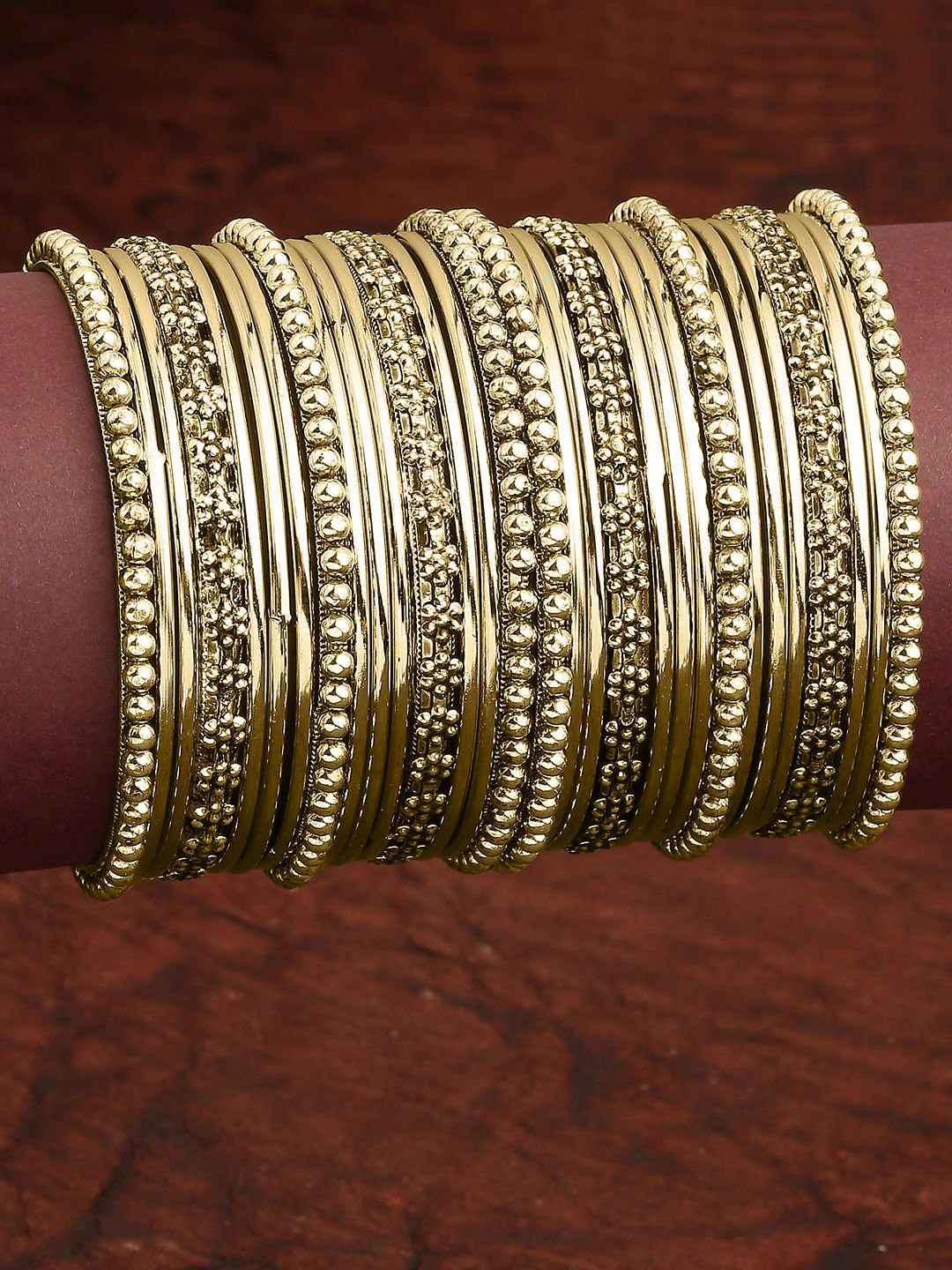 OOMPH Women Combo Of 30 Antique Gold Bangle Set