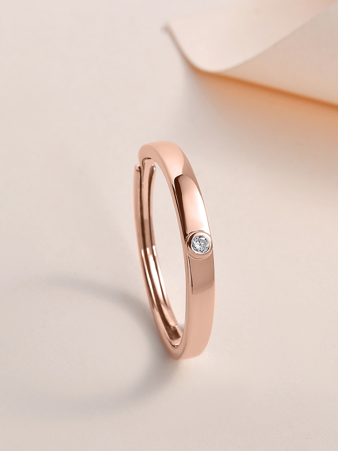 Ornate Jewels 925 Silver Rose Gold Plated AD Studded Eternity Adjustable Finger Ring