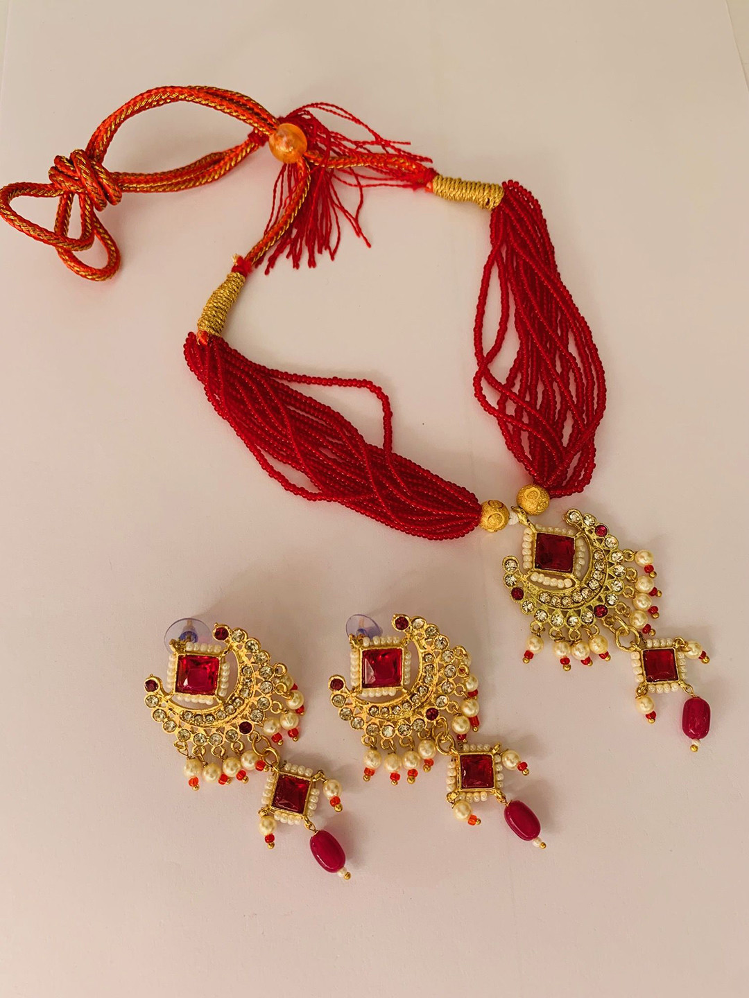 Maruti Rajasthan Gold Plated Artificial Stones Studded And Beaded Necklace and Earrings