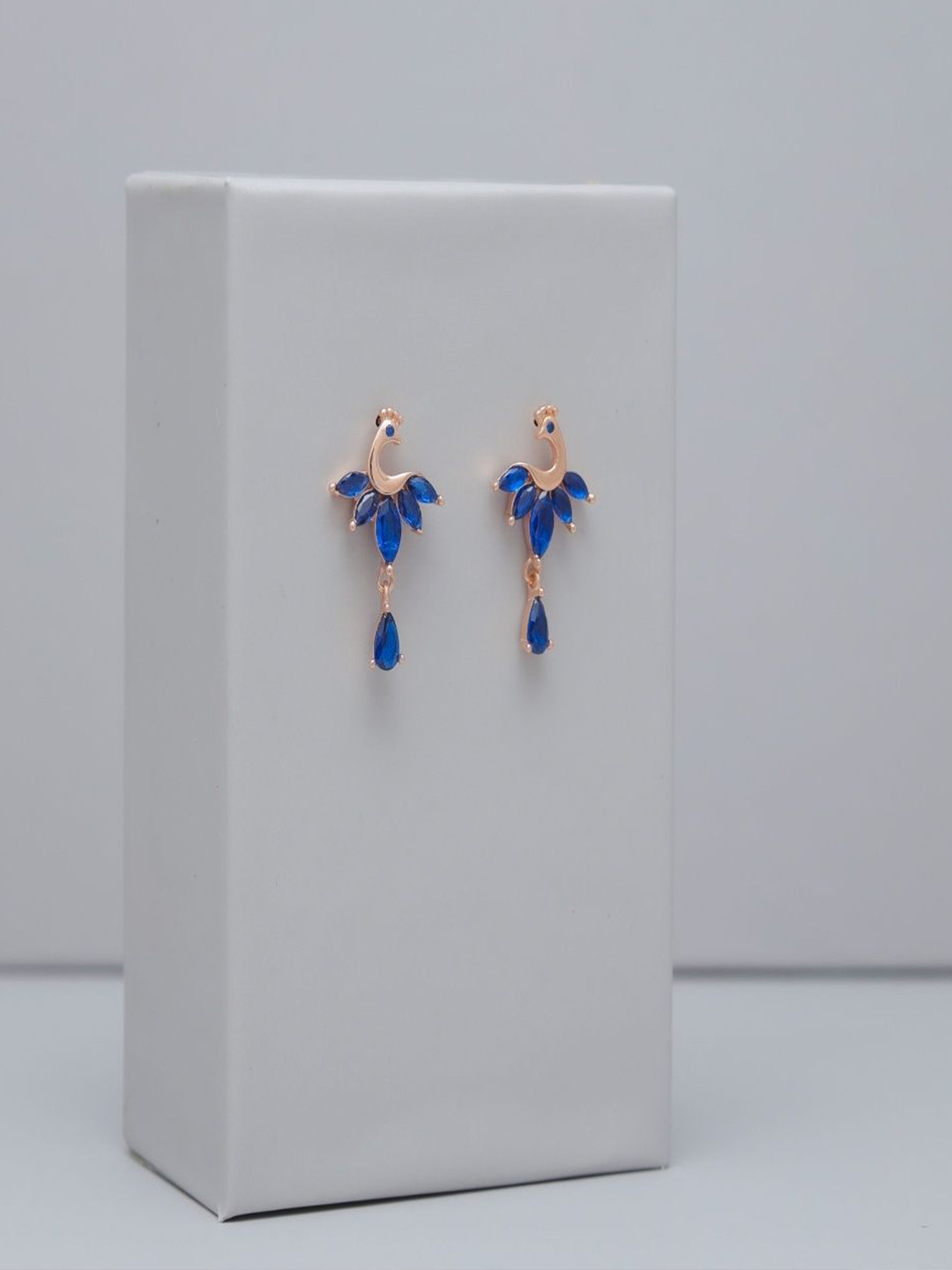 TASSYA Silver-Plated Sapphire Studded Teardrop Shaped Studs
