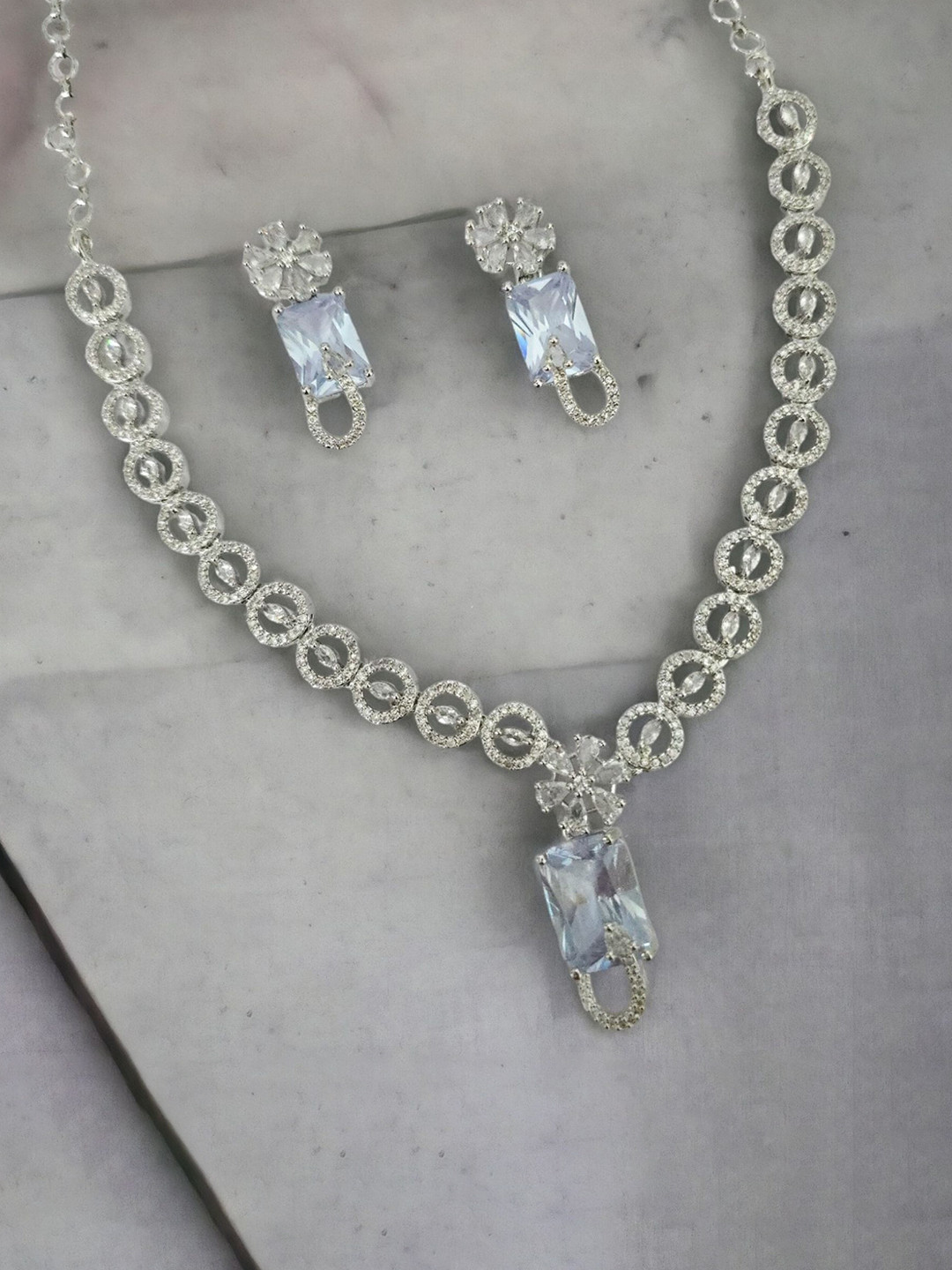 Opal Touch Rhodium-Plated American Diamond Studded Necklace And Earrings